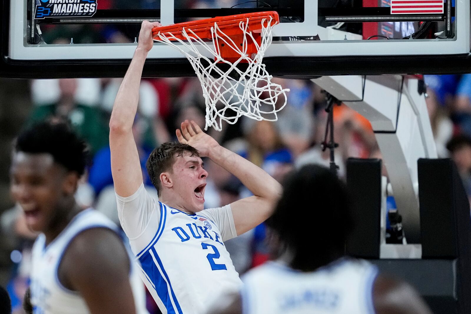 Duke forward Cooper Flagg (2) dunks during the first half in the second round of the NCAA college basketball tournament against Baylor, Sunday, March 23, 2025, in Raleigh, N.C. (AP Photo/Stephanie Scarbrough)