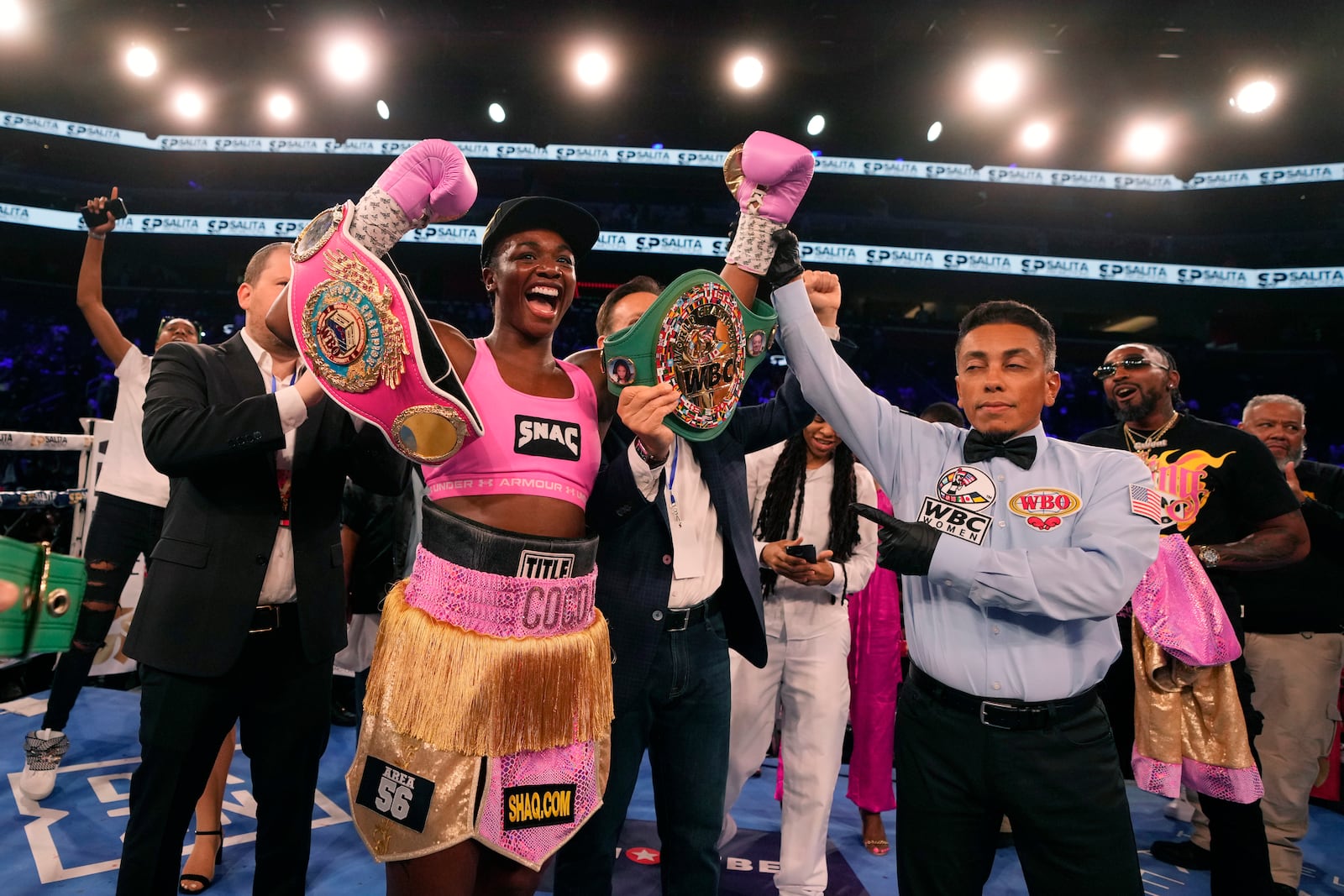 FILE - Middleweight champion Claressa Shields celebrates after defeating reigning WBC women's heavyweight boxing champion Vanessa Lepage-Joanisse of Quebec during a fight, Saturday, July 27, 2024, in Detroit. (AP Photo/Carlos Osorio, File)