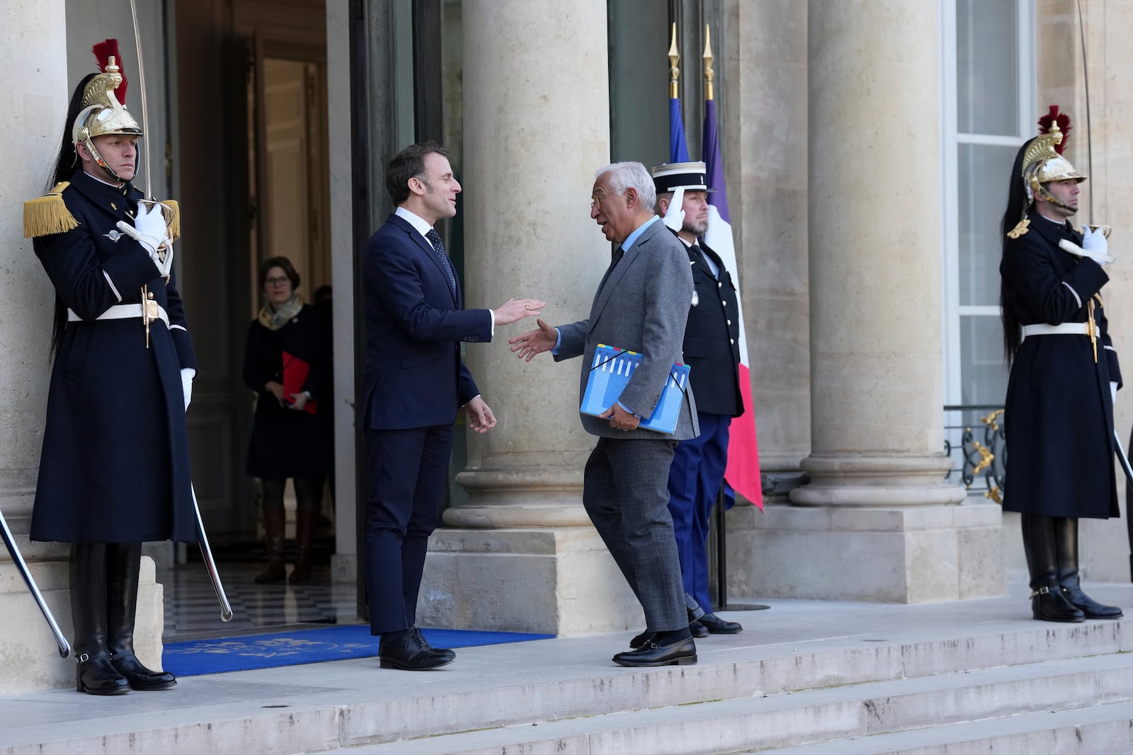 French President Emmanuel Macron, left, greets European Council President Antonio Costa as he arrives for an informal meeting of leaders from key European Union nations and the United Kingdom at the Elysee Palace in Paris, Monday, Feb. 17, 2025. (AP Photo/Aurelien Morissard)