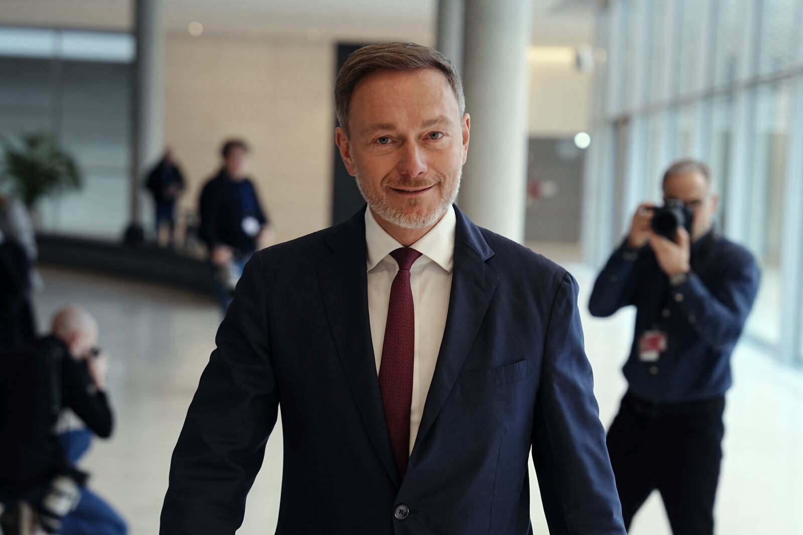 Christian Lindner, former Federal Minister of Finance and FDP federal party chairman, leaves a special parliamentary group meeting in the Bundestag before the vote on a Union bill for stricter migration rules, in Berlin, Friday Jan. 31, 2025. (Kay Nietfeld/dpa via AP)