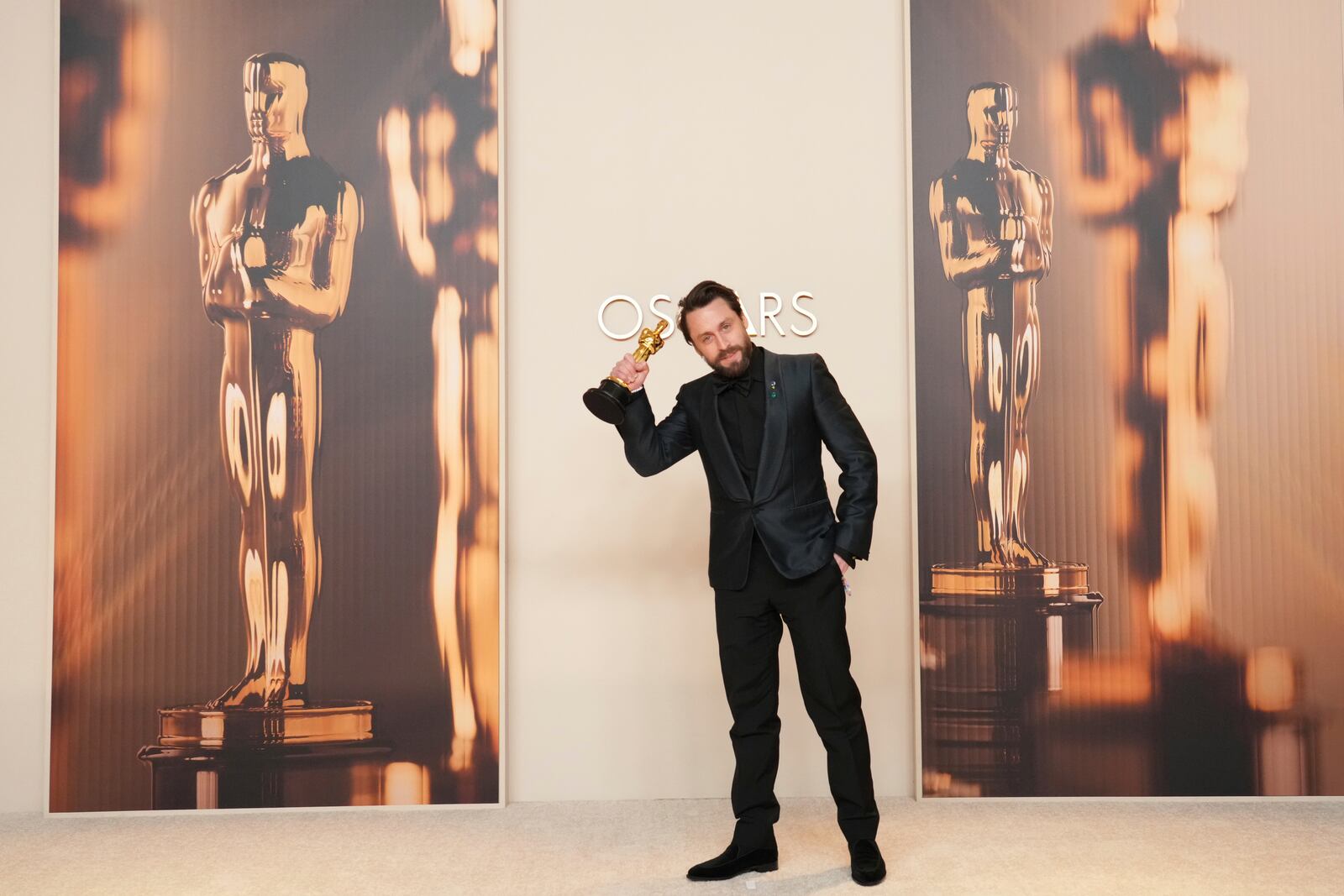 Kieran Culkin, winner of the award for best performance by an actor in a supporting role for "A Real Pain," poses in the press room at the Oscars on Sunday, March 2, 2025, at the Dolby Theatre in Los Angeles. (Photo by Jordan Strauss/Invision/AP)