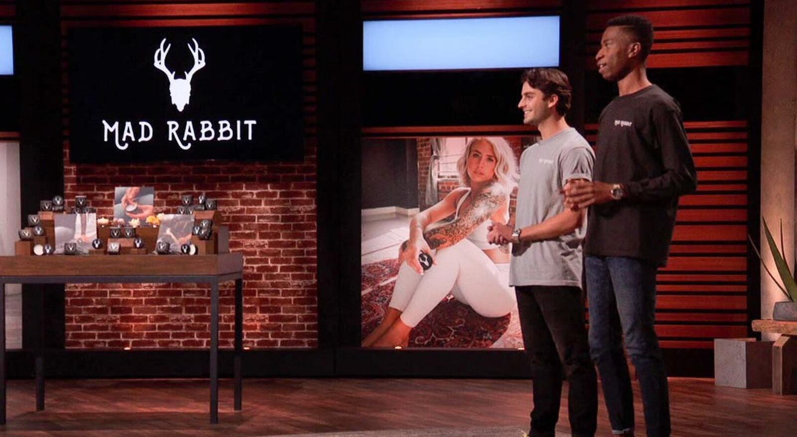 Recent Miami University graduates Oliver Zak (left) and Selom Agbitor impressed in their high-pressure debut last Friday on ABC's nationally televised show "Shark Tank." The pair, which created the Mad Rabbit skin care company, got investor Mark Cuban to pony up $500,000 for their start up firm. The two are shown on stage during the broadcast. (Provided Photo\Journal-News)