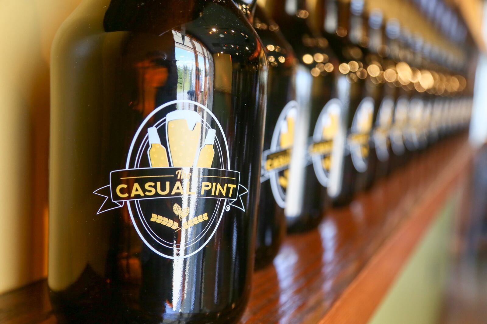 The Casual Pint, which opened earlier this year in Mason, plans to open a location in downtown Hamilton in 2018. The craft beer market features more than 30 beers on tap, food and a large selection of craft beers for retail sales. STAFF FILE PHOTO