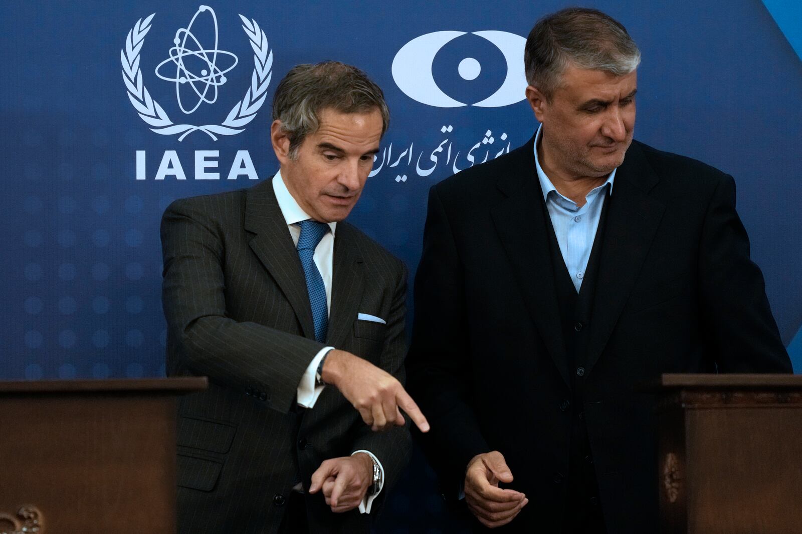 International Atomic Energy Agency, IAEA, Director General Rafael Mariano Grossi, left, gestures at the conclusion of his joint press conference Iran's Atomic Energy Organization head Mohammad Eslami in Tehran, Iran, Thursday, Nov. 14, 2024. (AP Photo/Vahid Salemi)