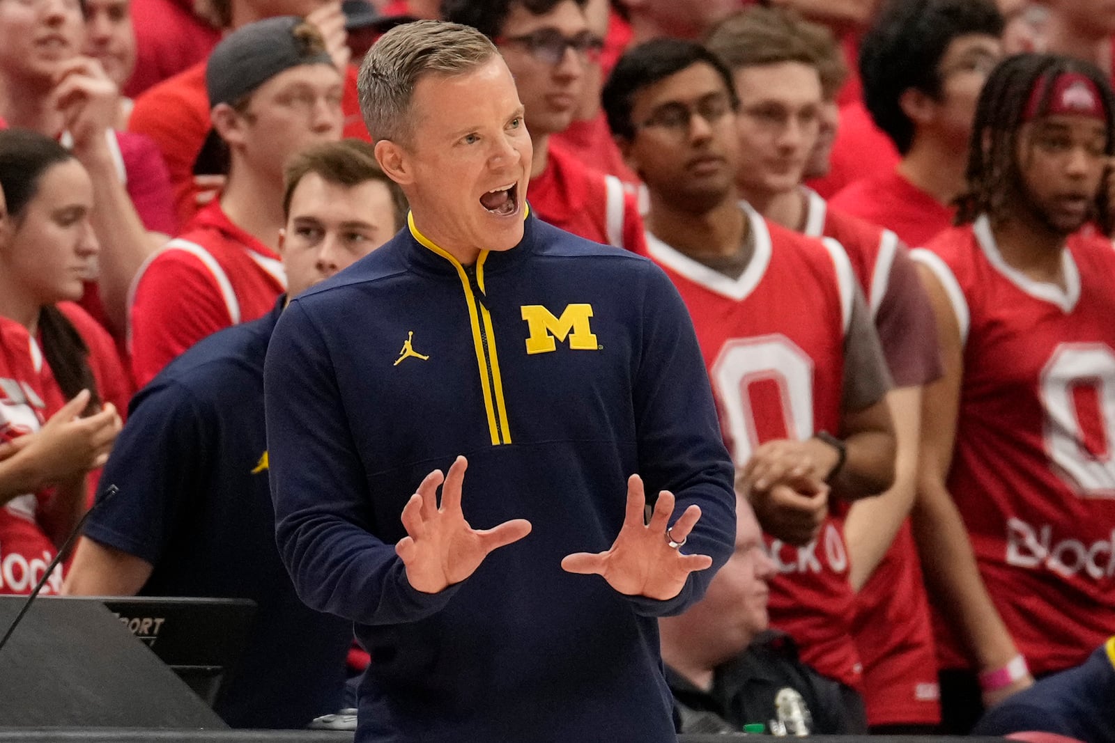 Michigan head coach Dusty May gestures in the second half of an NCAA college basketball game against Ohio State Sunday, Feb. 16, 2025, in Columbus, Ohio. (AP Photo/Sue Ogrocki)