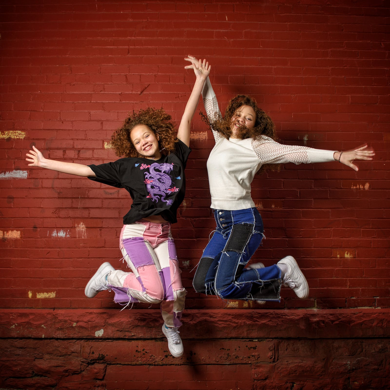 The Cunningham sisters, Marie, 13, left, and Macie, 15, have been singing on social media trying to spread a positive message and recently sent an audition video to the television show The Voice. NICK GRAHAM / STAFF