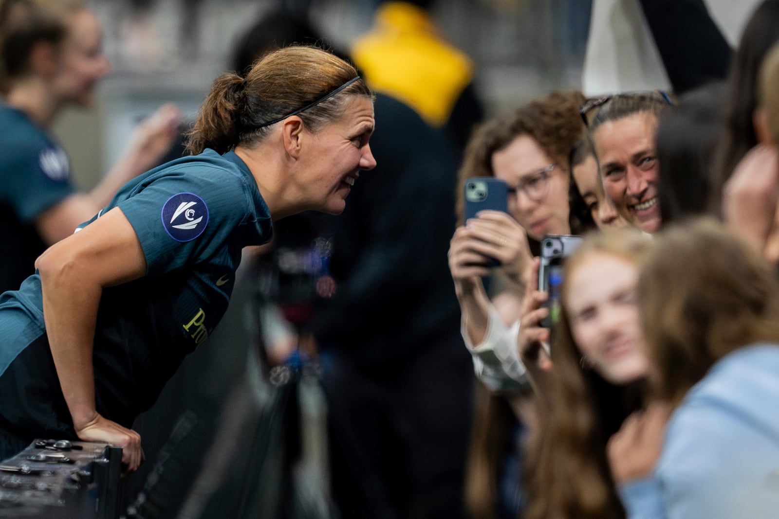 Portland Thorns FC's Christine Sinclair meets with fans after a CONCACAF W Champions Cup match against the Vancouver Whitecaps in Vancouver, British Columbia, Tuesday, Oct. 15, 2024. (Ethan Cairns/The Canadian Press via AP)