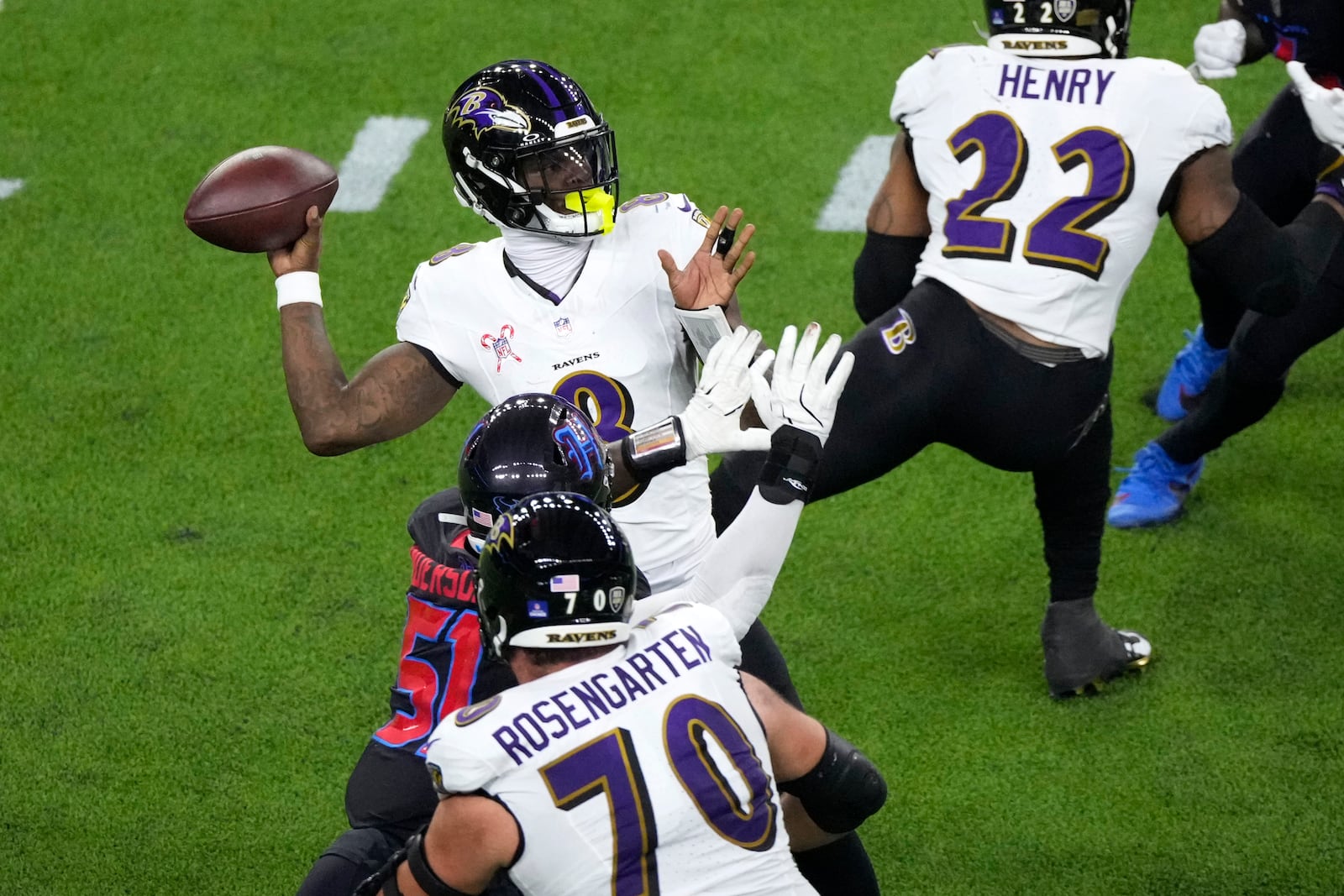 Baltimore Ravens quarterback Lamar Jackson throws a pass during the first half of an NFL football game against the Houston Texans, Wednesday, Dec. 25, 2024, in Houston. (AP Photo/Eric Christian Smith)