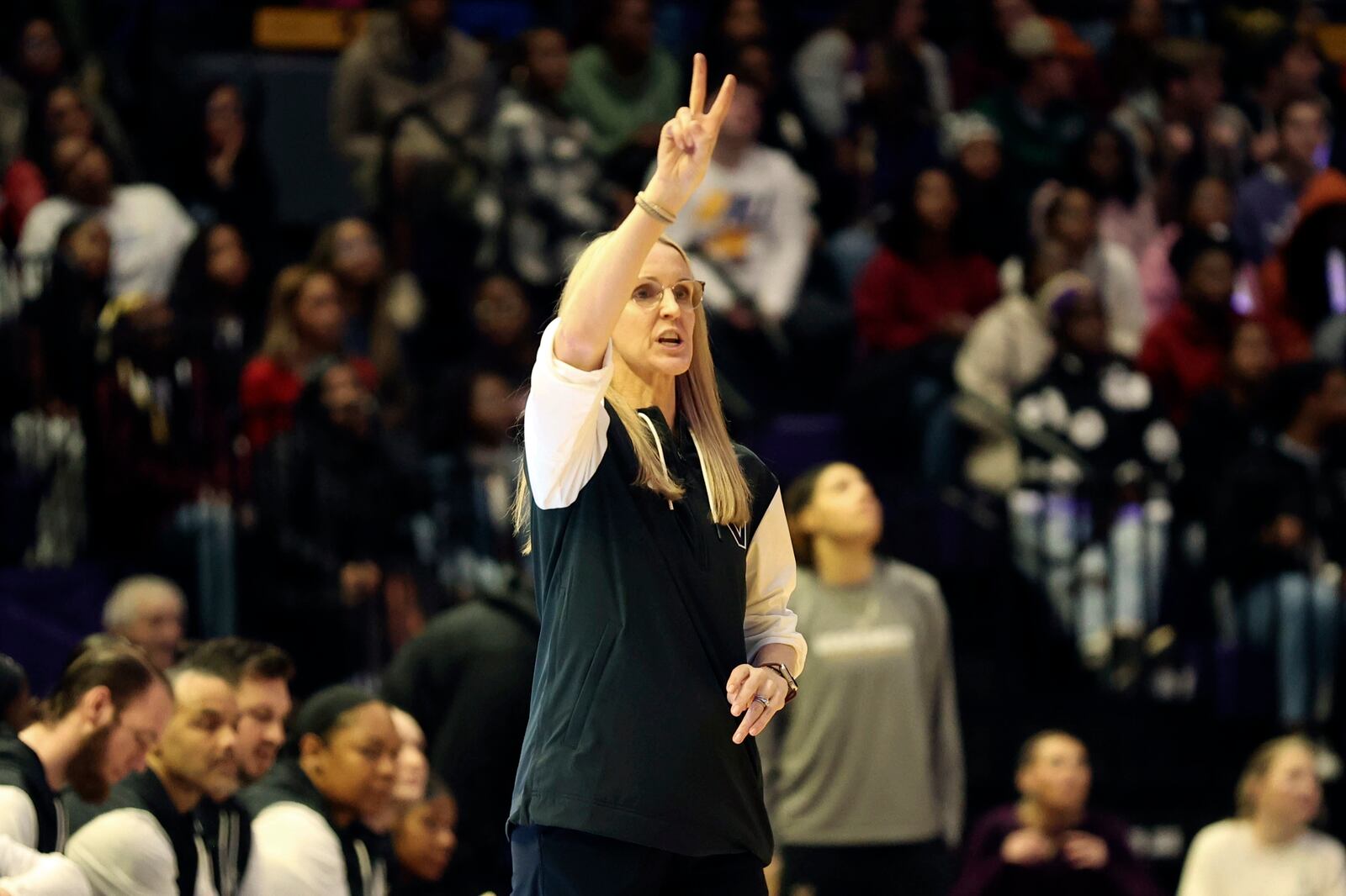 Vanderbilt head coach Shea Ralph calls plays to her team on the floor during the first half of an NCAA college basketball game against LSU in Baton Rouge, La., Monday, Jan. 13, 2025. (AP Photo/Peter Forest)