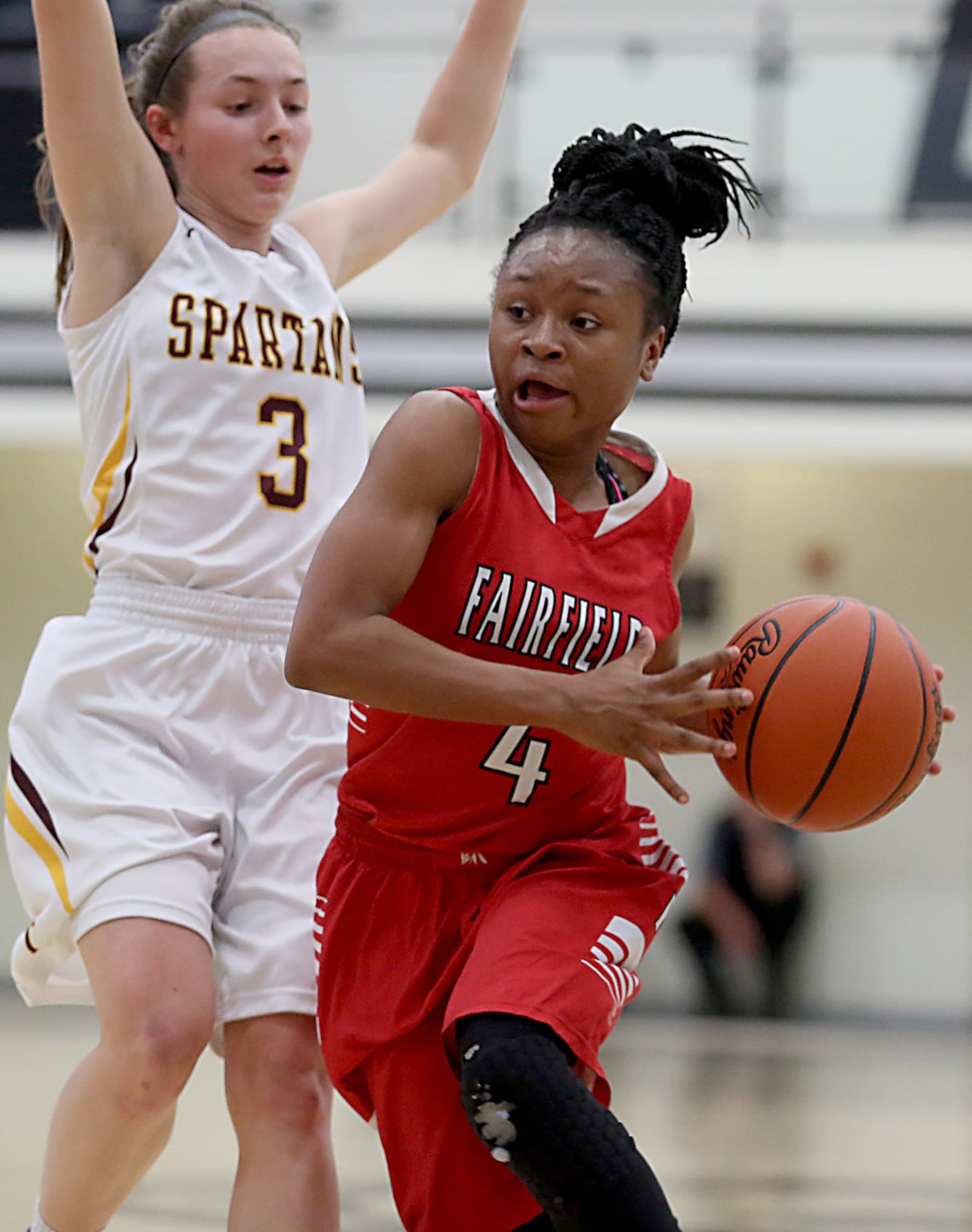 Fairfield guard Zahrya Bailey is covered by Turpin guard Kaitlyn Workman during their Division I sectional game at Lakota East on Feb. 23, 2017. Turpin won 45-30. CONTRIBUTED PHOTO BY E.L. HUBBARD