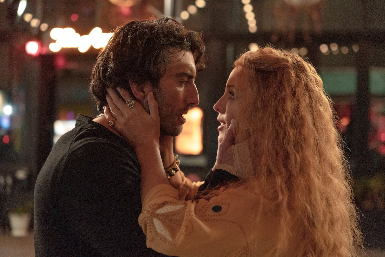 This image released by Sony Pictures shows Justin Baldoni, left, and Blake Lively in a scene from "It Ends With Us." (Nicole Rivelli/Sony Pictures via AP)