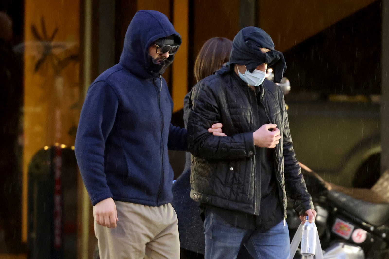 FILE - Former FBI informant Alexander Smirnov, left, walks out of his lawyer's office in downtown Las Vegas after being released from federal custody Feb. 20, 2024. (K.M. Cannon/Las Vegas Review-Journal via AP, File)