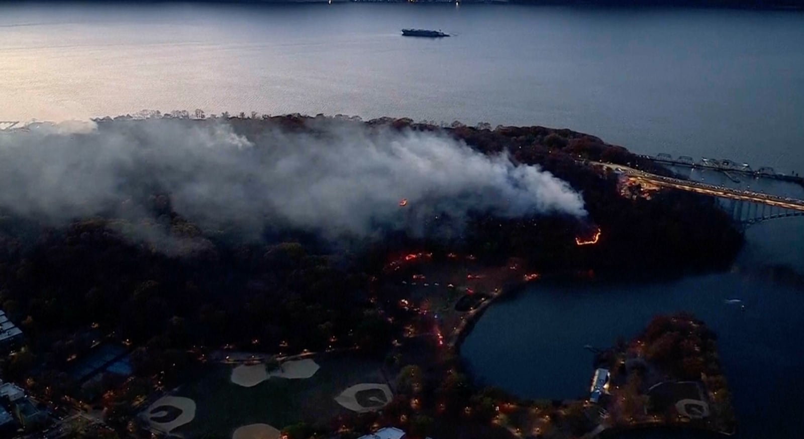 This aerial image taken from video shows a brush fire that broke out in a park on the northern tip of Manhattan in Inwood, N.Y., Wednesday, Nov. 13, 2024. (WABC-TV via AP)