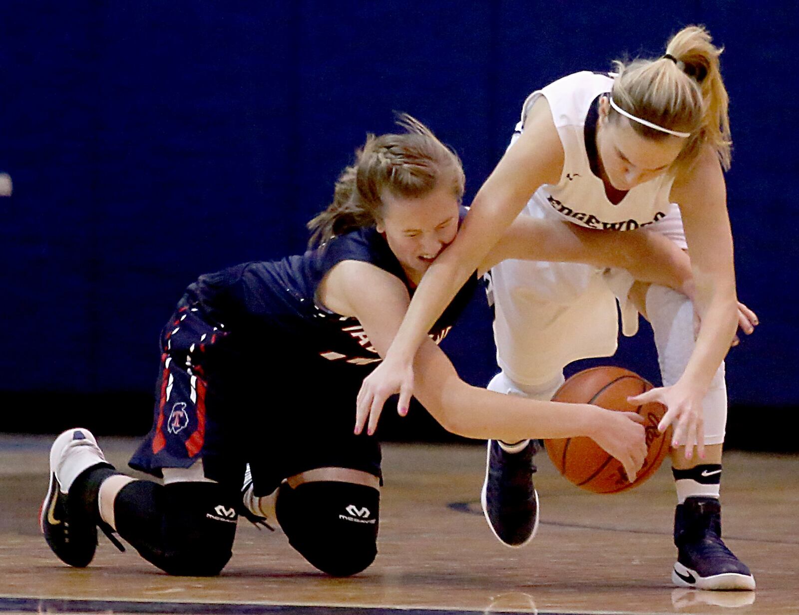 Talawanda guard Addie Brown (left) and Edgewood guard Jessa Brown chase a loose ball on Wednesday night at Ron Kash Court in Trenton. CONTRIBUTED PHOTO BY E.L. HUBBARD