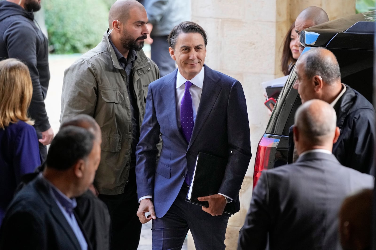 Amos Hochstein, center, a senior adviser to President Joe Biden, is received ahead of a meeting with Lebanese Parliament speaker Nabih Berri, in Beirut, Lebanon, Tuesday, Nov. 19, 2024. (AP Photo/Hassan Ammar)