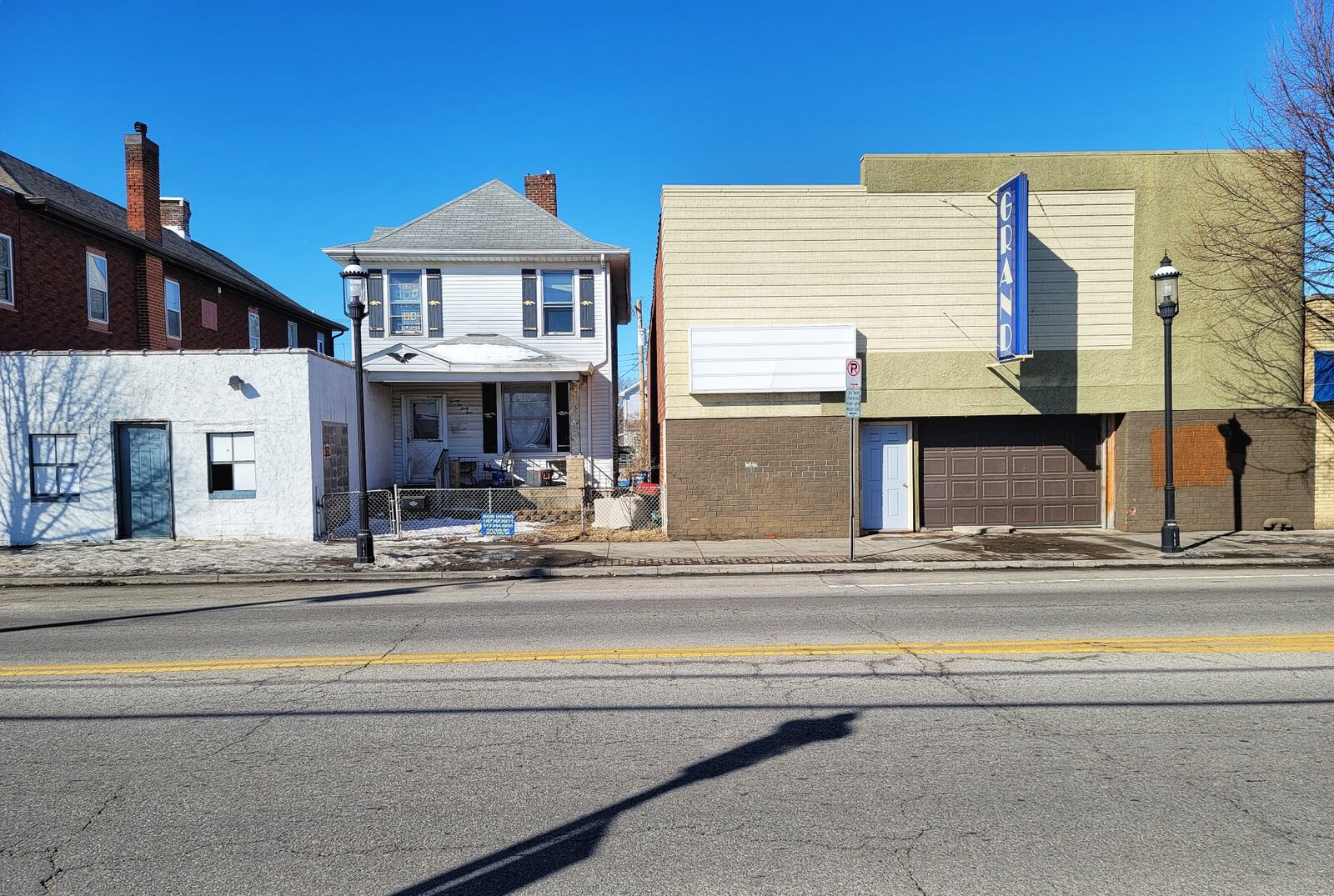 Hamilton City Council on Wednesday will consider buying the property containing the former Grand theater, at 2233 Pleasant Ave., and the house next door at 2241 Pleasant. NICK GRAHAM/STAFF