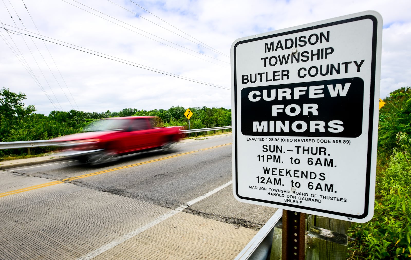 A sign displaying curfew times for minors is on display along OH-122 entering Madison Township. Middletown police recently reminded people via Facebook about the city’s curfew for juveniles, which has been on the books for years. Middletown Police Chief Rodney Muterspaw said in recent years it has been enforced and admitted it is a rather old-fashion law, but a jump in juvenile arrests going into the summer and what officers are seeing on the street means the curfew laws will have more teeth this year. NICK GRAHAM/STAFF