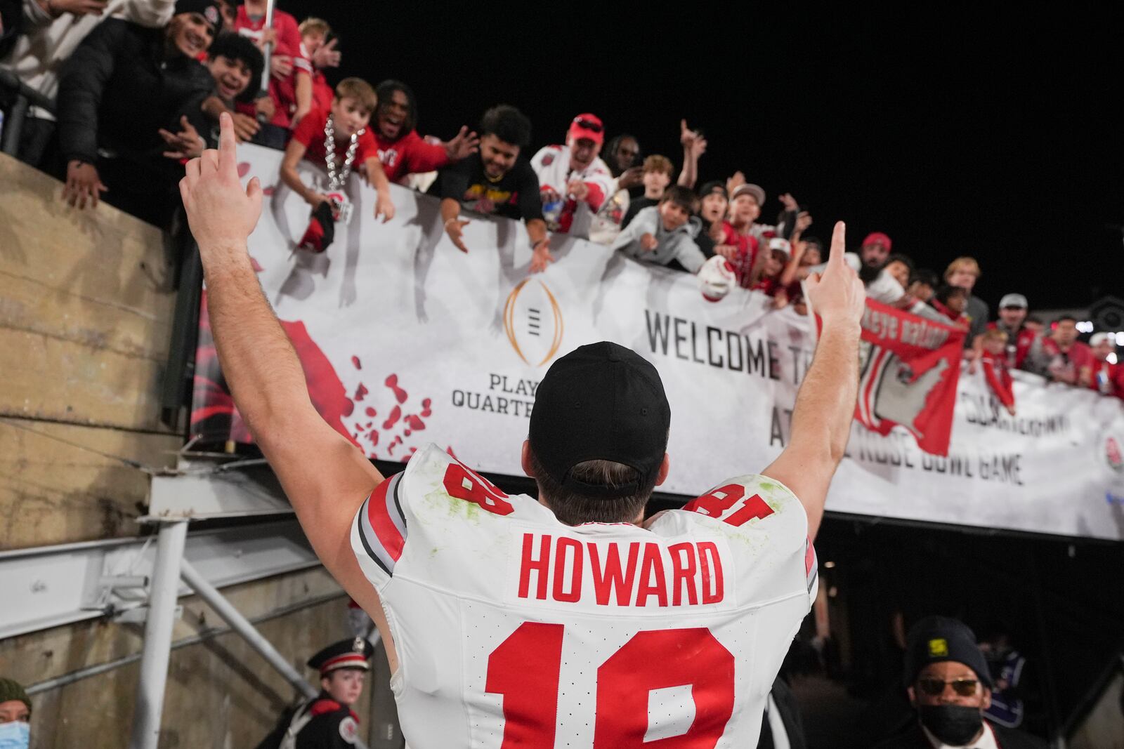 Ohio State quarterback Will Howard (18) celebrates with fans after the quarterfinals of the Rose Bowl College Football Playoff against Oregon, Wednesday, Jan. 1, 2025, in Pasadena, Calif. (AP Photo/Mark J. Terrill)