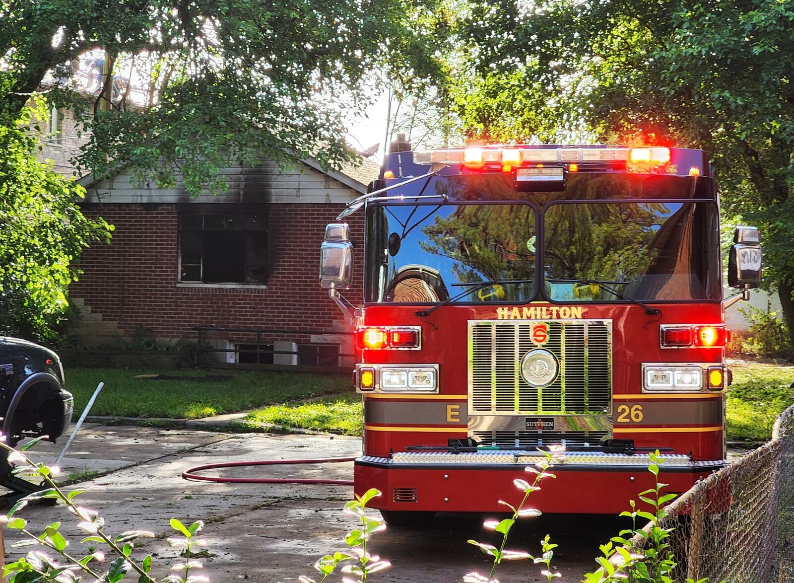 Hamilton firefighters were dispatched to the 3800 block of Pleasant Avenue for a structure fire and found heavy fire and smoke coming from the building, according to officials. NICK GRAHAM / STAFF