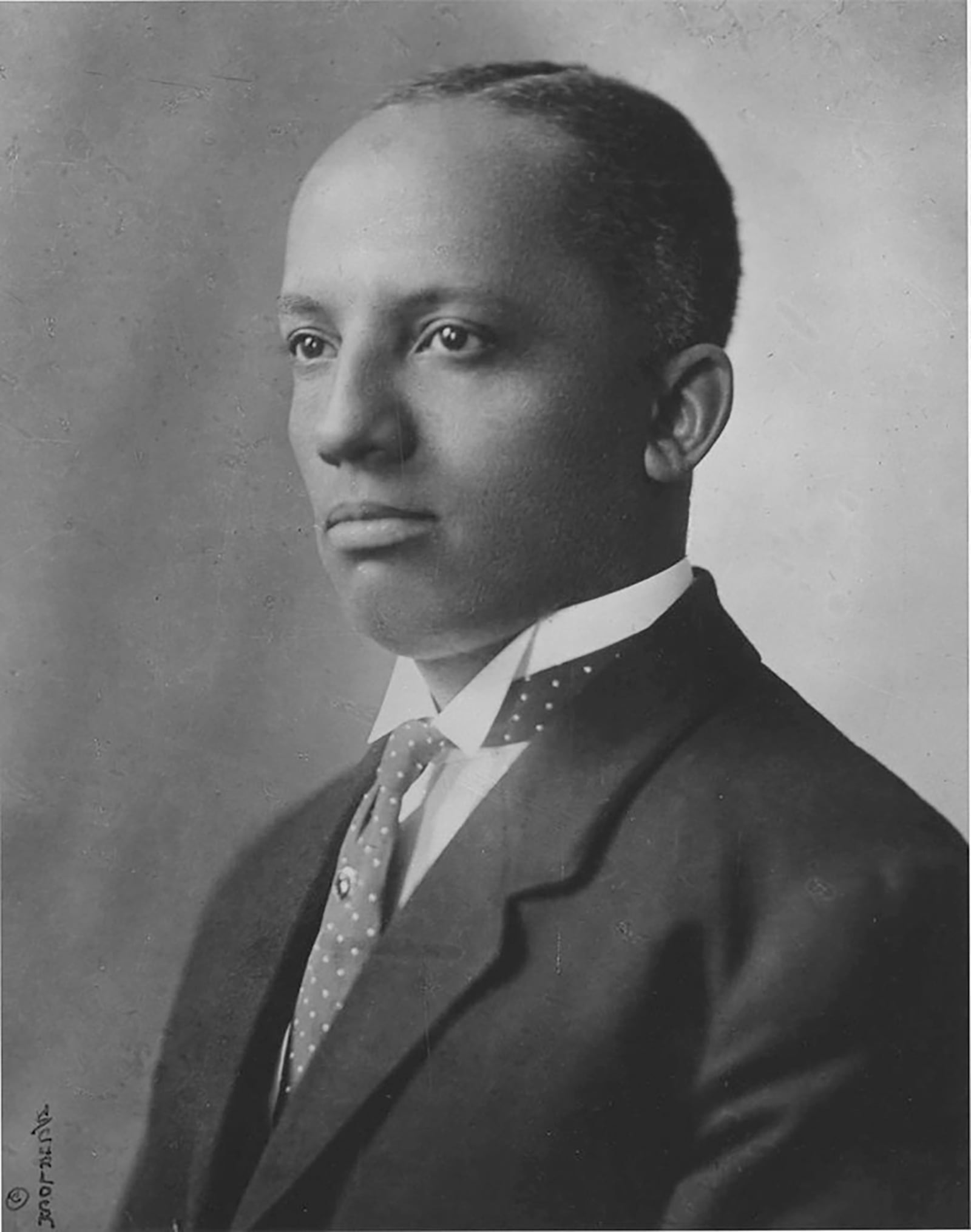 This undated photo provided by the Association for the Study of African American Life and History (ASALH) shows historian and author Carter G. Woodson. (ASALH via AP)