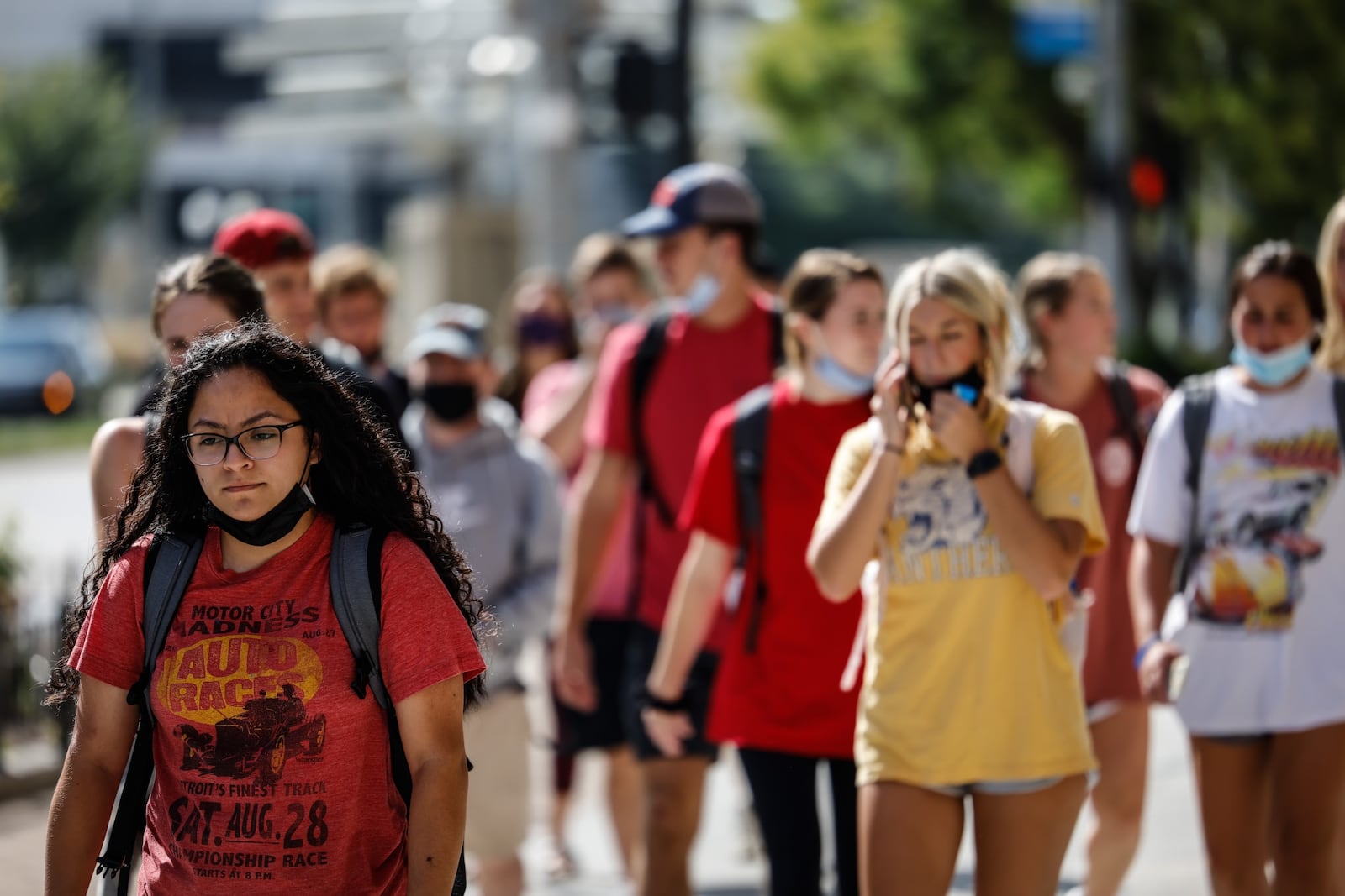 UD students make their way up Main St. to class at The Hub at the Dayton Arcade. Dayton City Commission approved a mask mandate for public indoor spaces. Jim Noelker/Staff