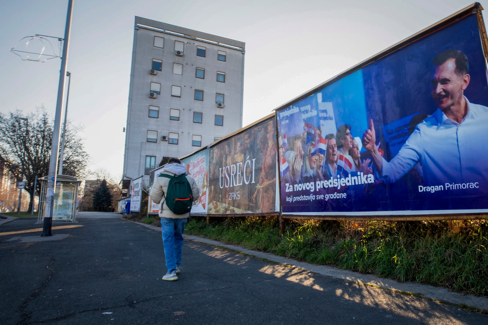 A campaign poster of residential candidate Dragan Primorac hangs ahead of the presidential election in Zagreb, Croatia, Thursday, Dec. 26, 2024. (AP Photo)