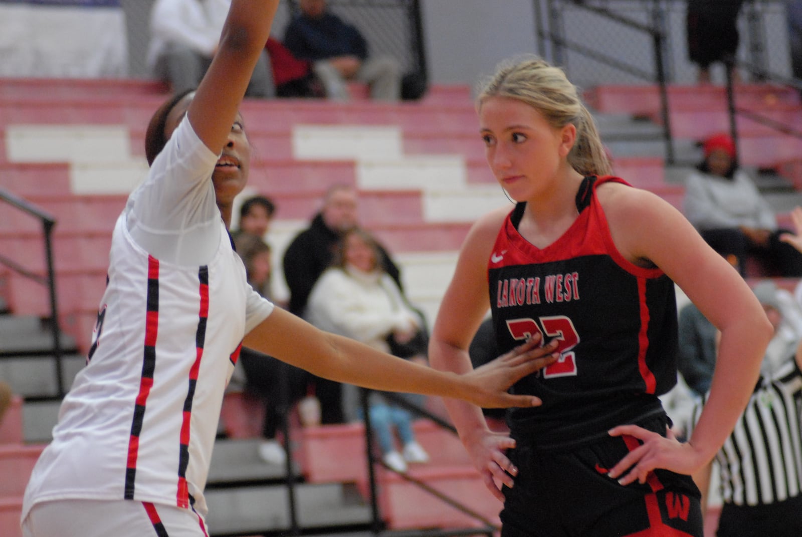 Lakota West's Katie Fox is guarded by Fairfield's Kayla McCoy during an inbounds play on Saturday. Chris Vogt/CONTRIBUTED