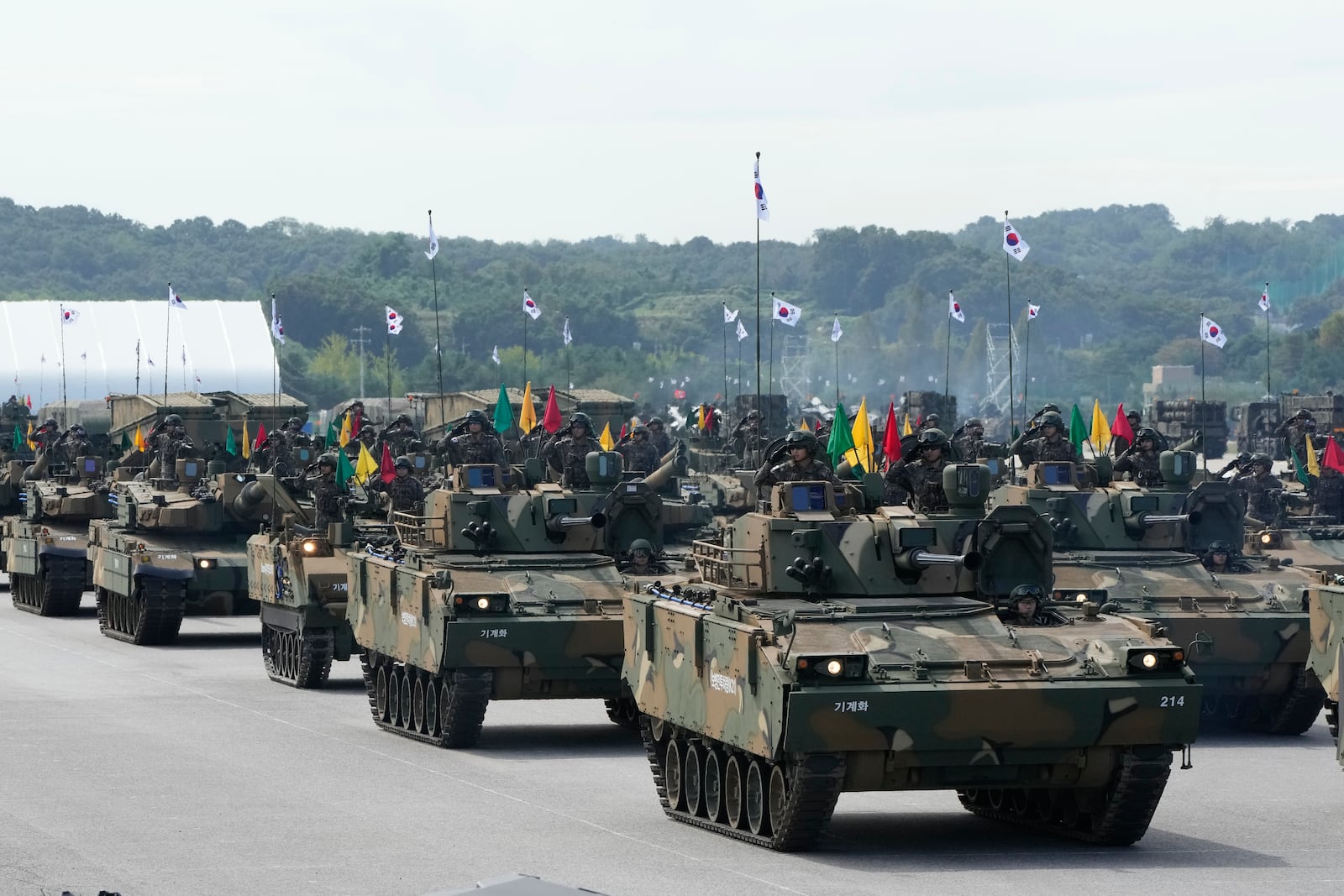 FILE - South Korean mechanized unit personnel parade with their armored vehicles during the media day for the 76th anniversary of Armed Forces Day at Seoul air base in Seongnam, South Korea, on Sept. 25, 2024. (AP Photo/Ahn Young-joon, File)