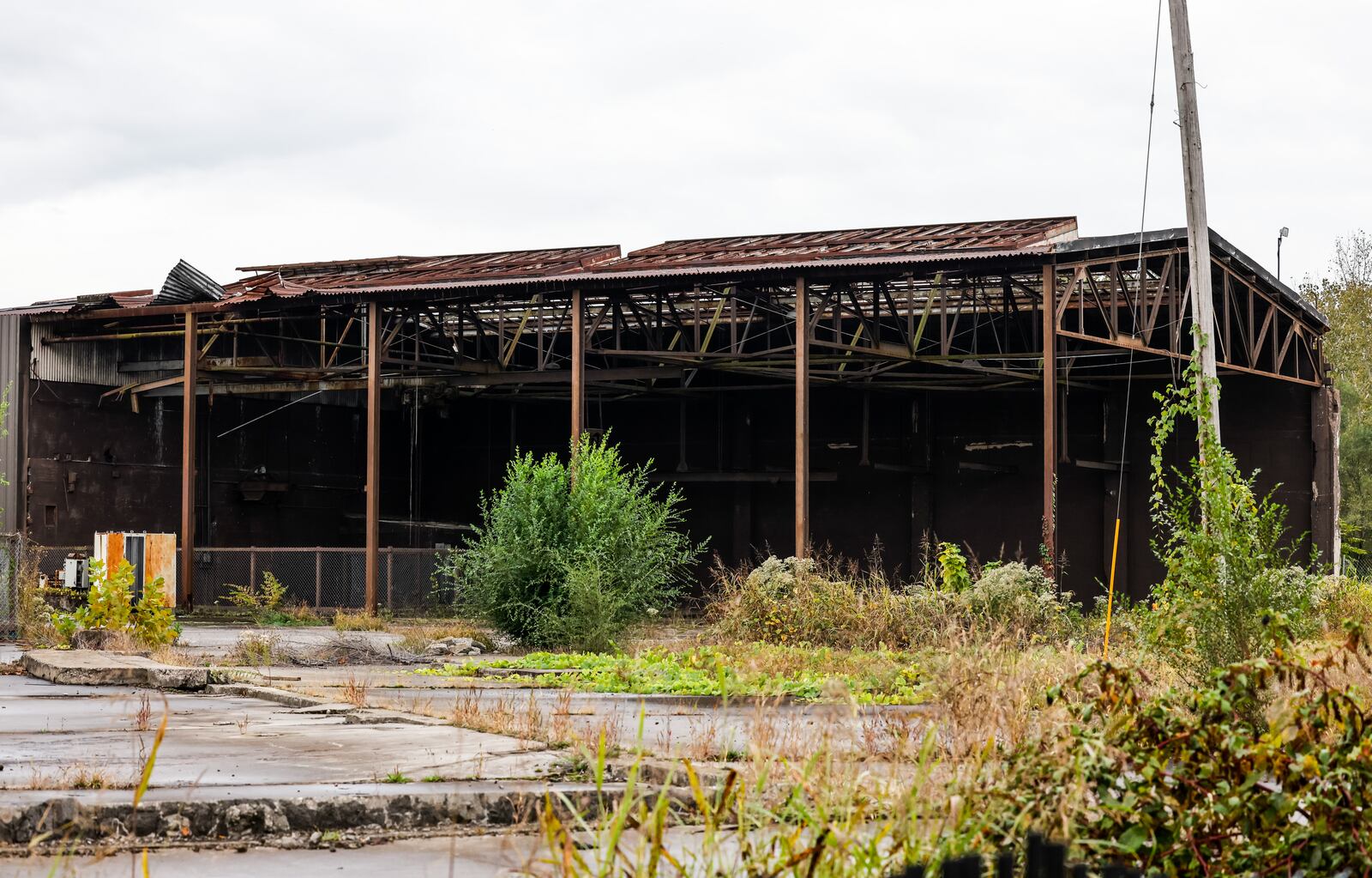 The Whitt Machine Shop and multiple other buildings would need to be removed, renovated or built around if Main Street Community Capital were allowed to design and build Hollywoodland as presented on more than 50 acres near the Great Miami River and historic downtown Middletown. NICK GRAHAM / STAFF