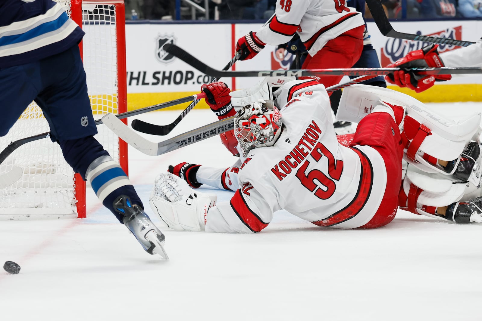 Carolina Hurricanes' Pyotr Kochetkov makes a save against the Columbus Blue Jackets' during the second period of an NHL hockey game, Tuesday, Dec. 31, 2024, in Columbus, Ohio. (AP Photo/Jay LaPrete)