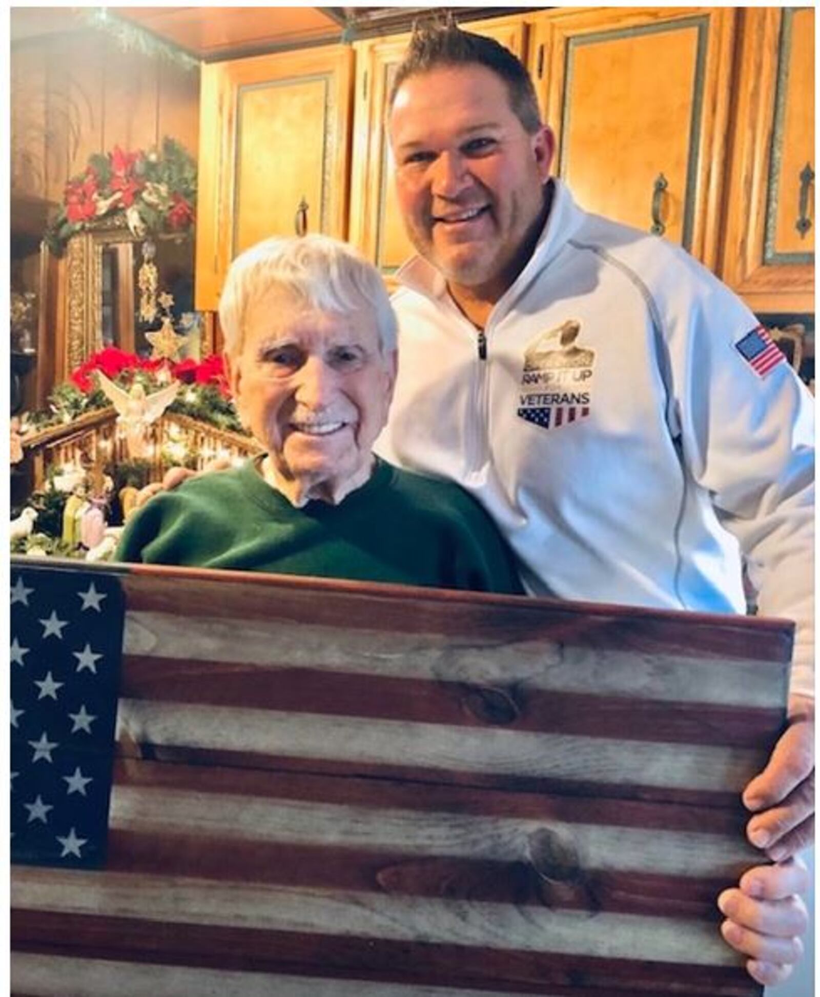 Greg Schneider, left, of Operation Ramp It Up is with a veteran from Harrison, Ohio who received a wheelchair ramp from the Butler County nonprofit. CONTRIBUTED