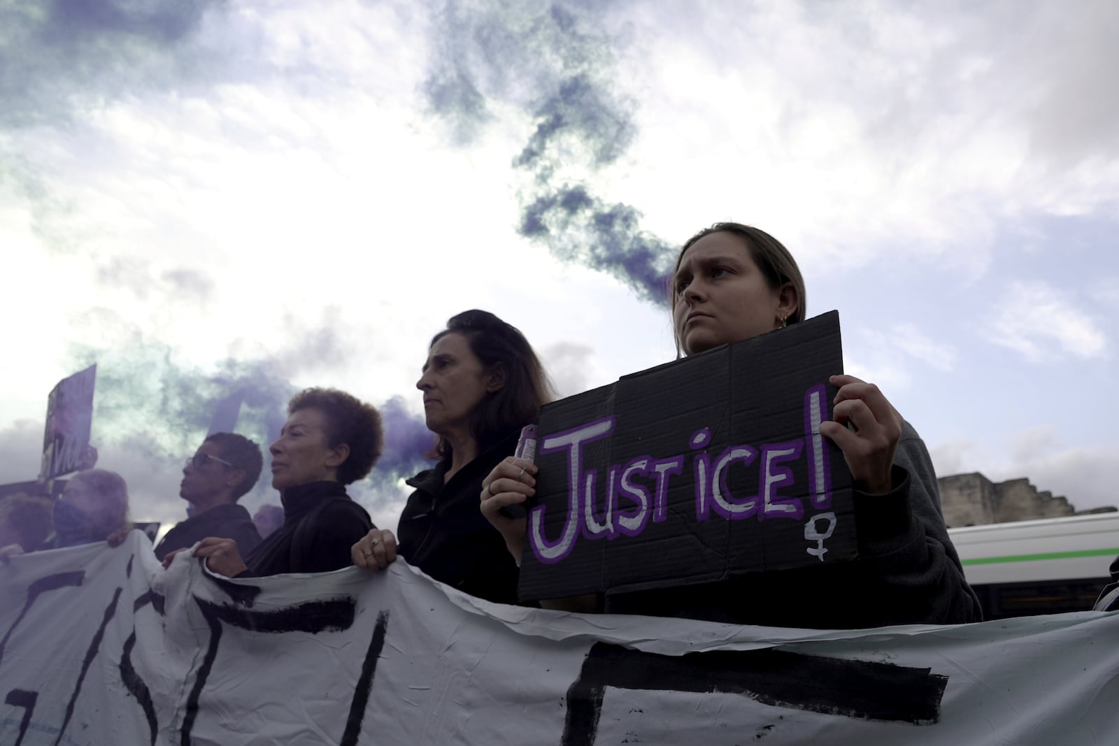 Women demonstrate to mark the International Day for the Elimination of Violence against Women, as the trial of dozens of men accused of raping Gisele Pelicot while she was drugged and rendered unconscious by her husband goes on, Monday, Nov. 25, 2024 in Avignon, southern France. (AP Photo/John Leicester)