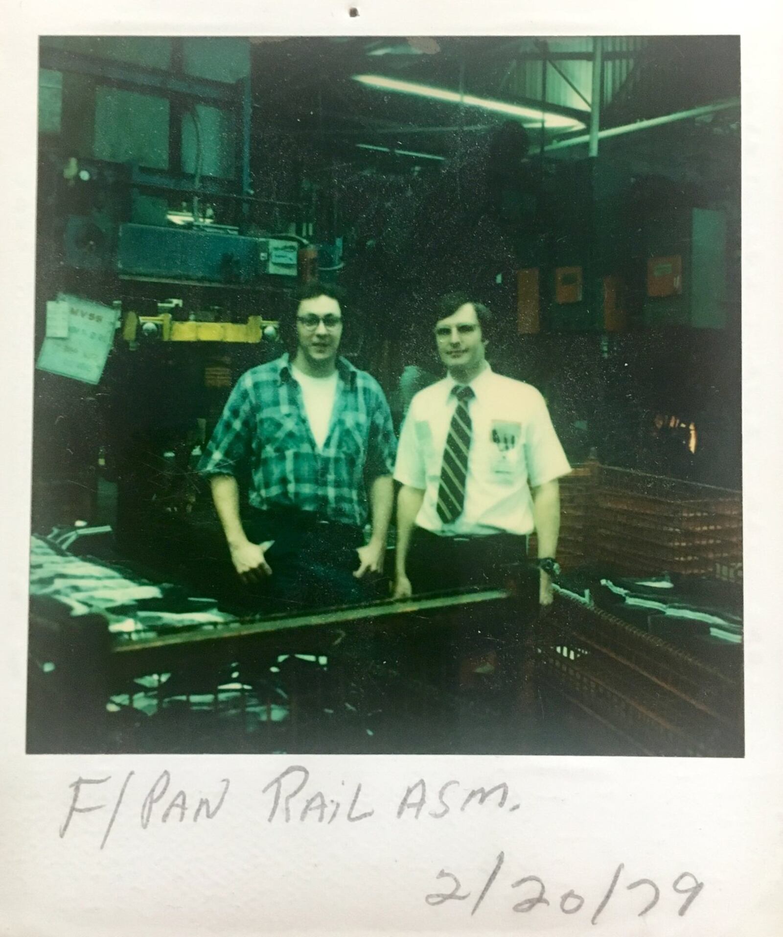 Bob Link, at left, is pictured inside the Fisher Body plant in 1979. This is one of the rare photos inside the plant. PROVIDED/BOB LINK