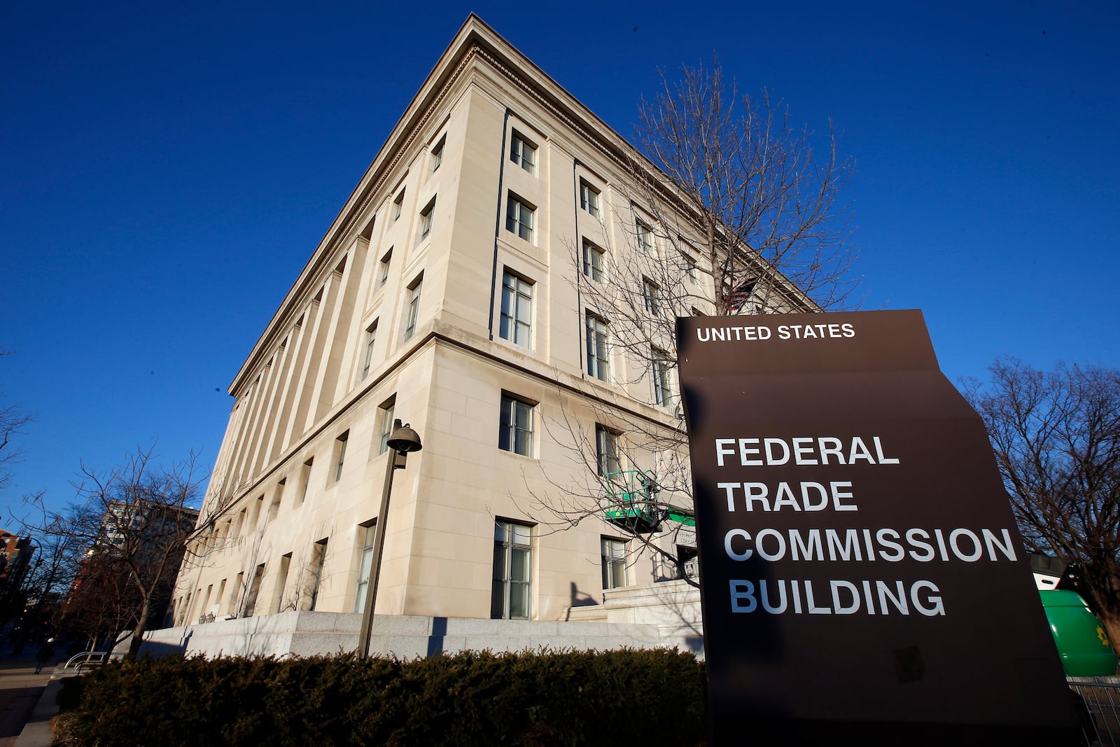 FILE - Signage marks the Federal Trade Commission building in Washington, Jan. 28, 2015. (AP Photo/Alex Brandon, File)