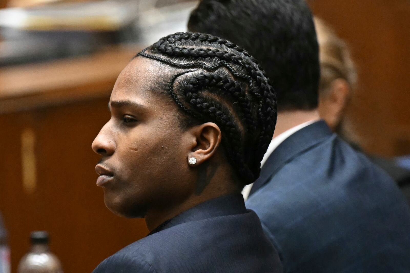 A$AP Rocky listens to closing arguments during his trial in Los Angeles, Friday, Feb. 14, 2024. (Patrick T. Fallon/ Pool Photo via AP)