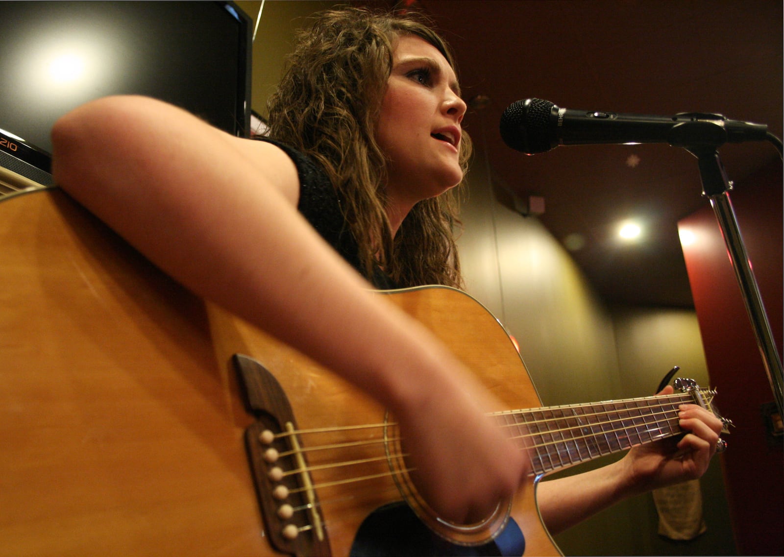 FILE PHOTO/2009: Guitarist Ashley Brandenburg sings her original songs at Kidd Coffee in Middletown Saturday evening, Jan. 31, 2009. FILE PHOTO/JESSICA UTTINGER (CONTRIBUTOR)