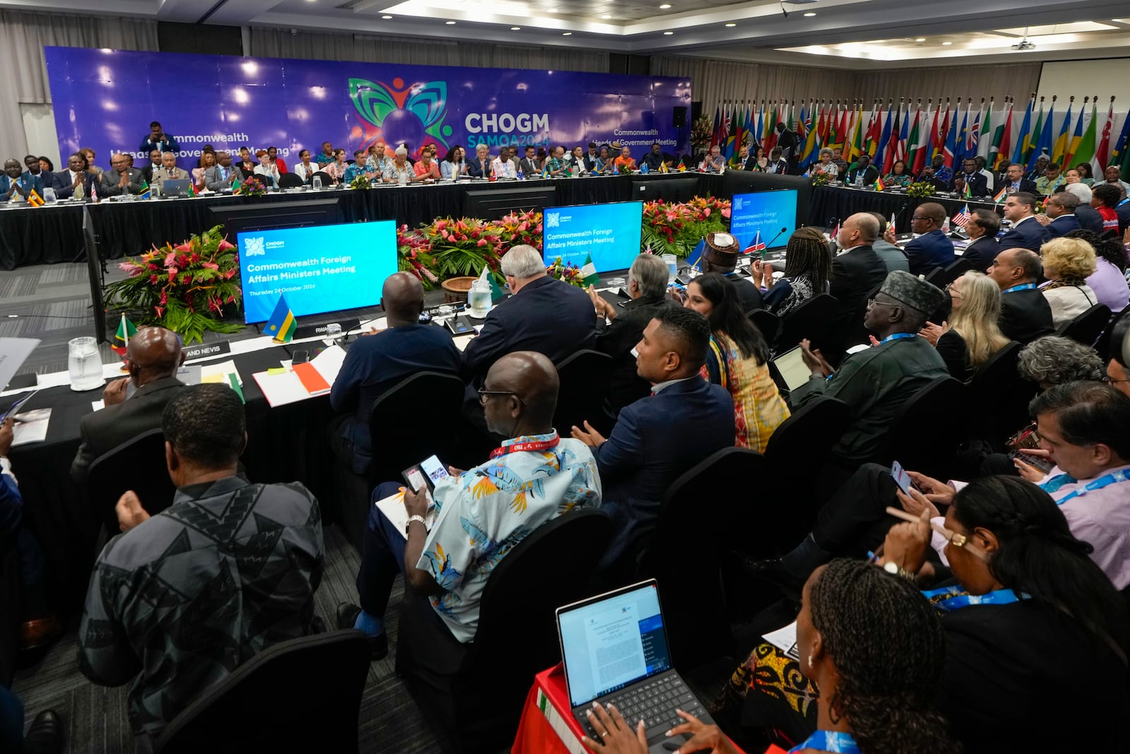 Delegates attend the Foreign Ministers meeting at the Commonwealth Heads of Government meeting in Apia, Samoa, Thursday, Oct. 24, 2024. (AP Photo/Rick Rycroft/Pool)