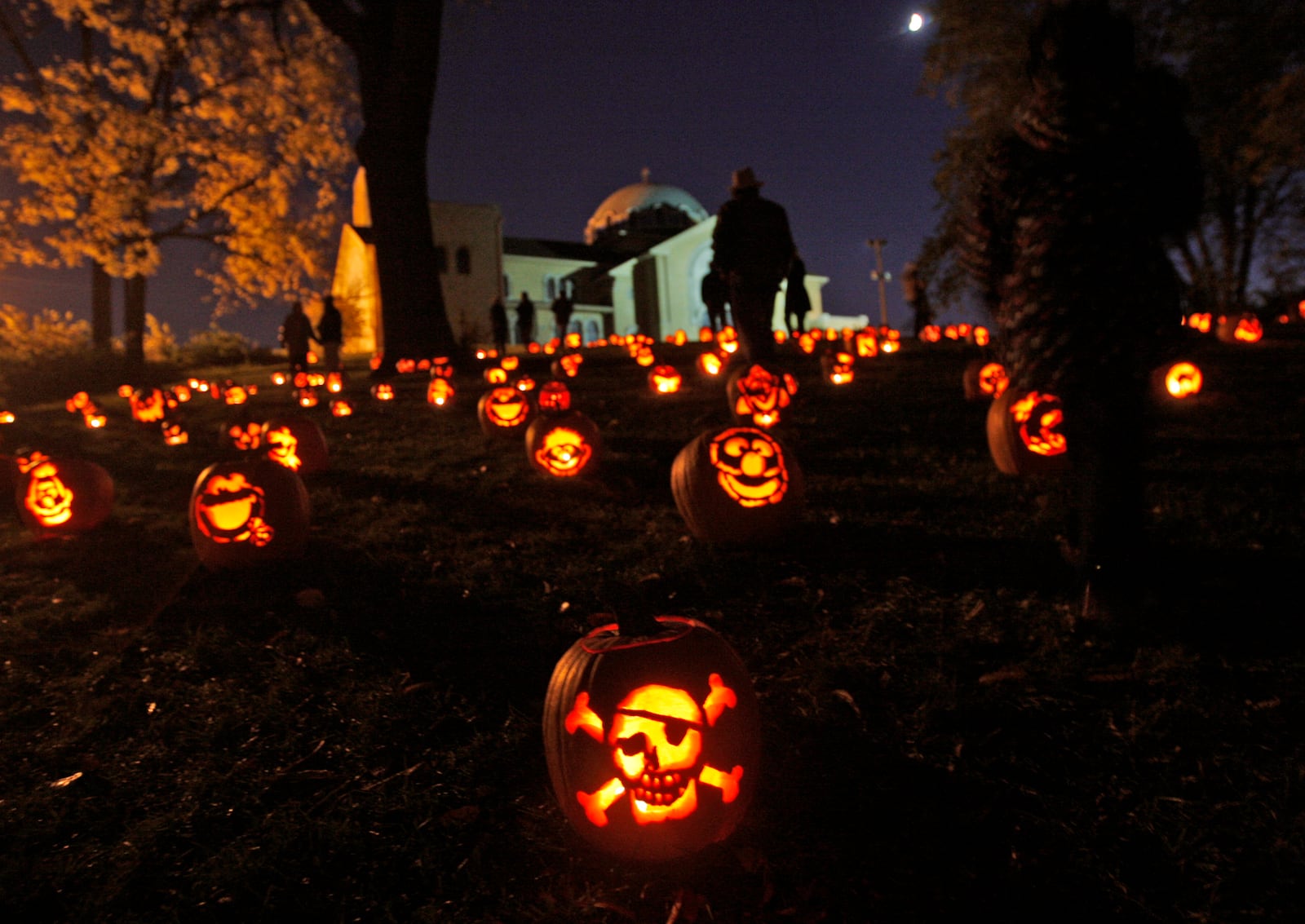 Judith Chaffin, known as the “The Pumpkin Lady,” began the Stoddard Avenue Pumpkin Glow in Dayton’s Grafton Hill neighborhood in 1994.  The 2019 pumpkin glow will be held Oct. 28 and 29.  DAYTON DAILY NEWS STAFF FILE PHOTO