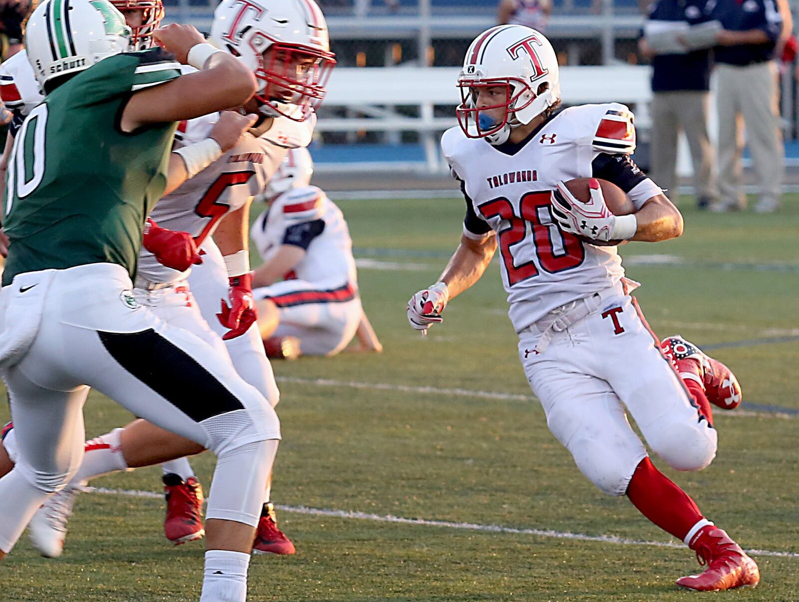 Talawanda’s Blake Bryan carries against Badin during their game at Virgil Schwarm Stadium in Hamilton on Sept. 3, 2016. The visiting Braves lost 38-7. CONTRIBUTED PHOTO BY E.L. HUBBARD