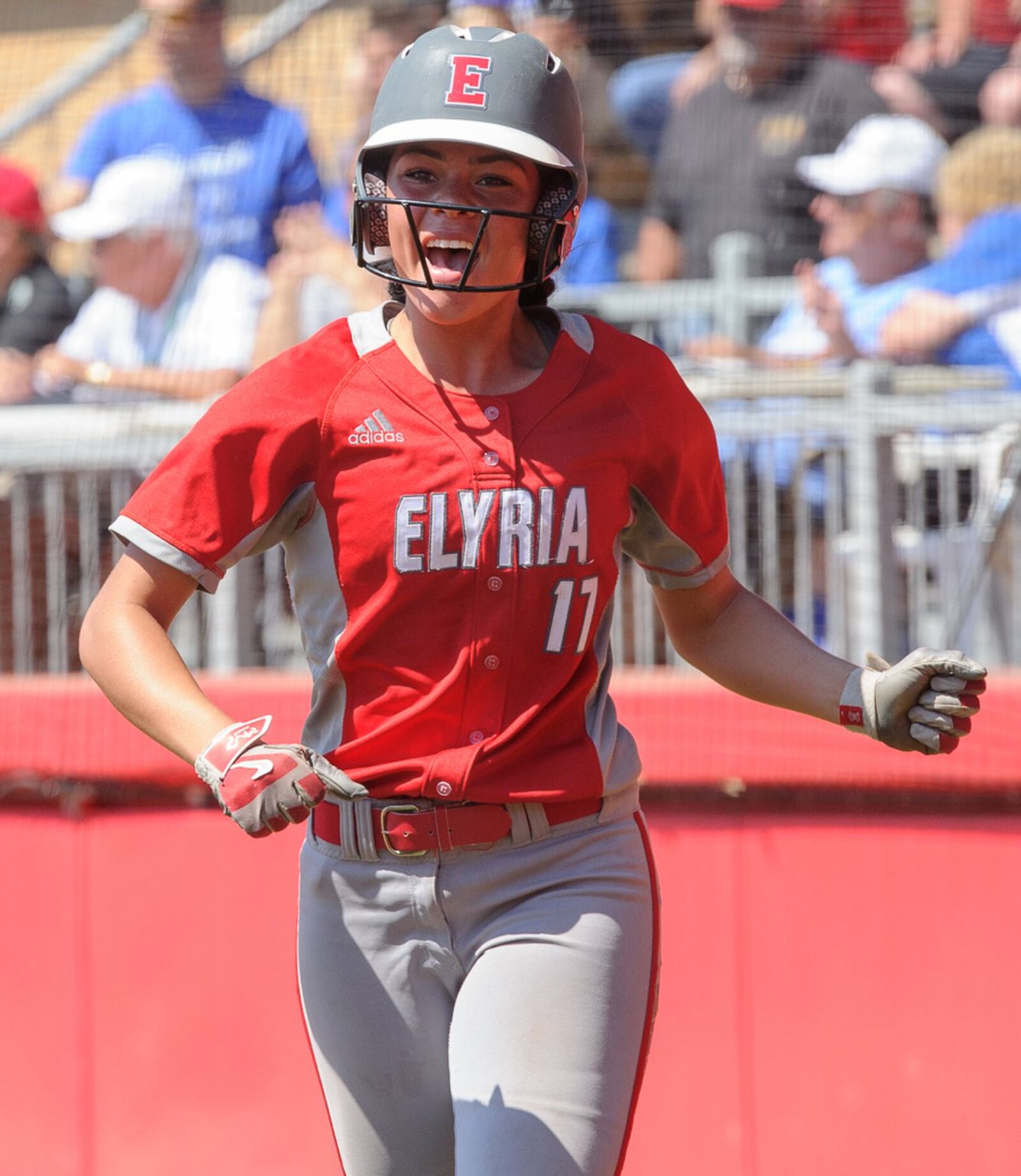 Elyria’s Dierra Hammons is happy after scoring a run during Saturday’s Division I state final against Lebanon at Firestone Stadium in Akron. CONTRIBUTED PHOTO BY BRYANT BILLING