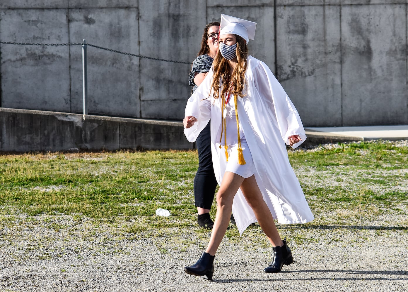 Madison High School drive-thru graduation ceremony at Land of Illusion