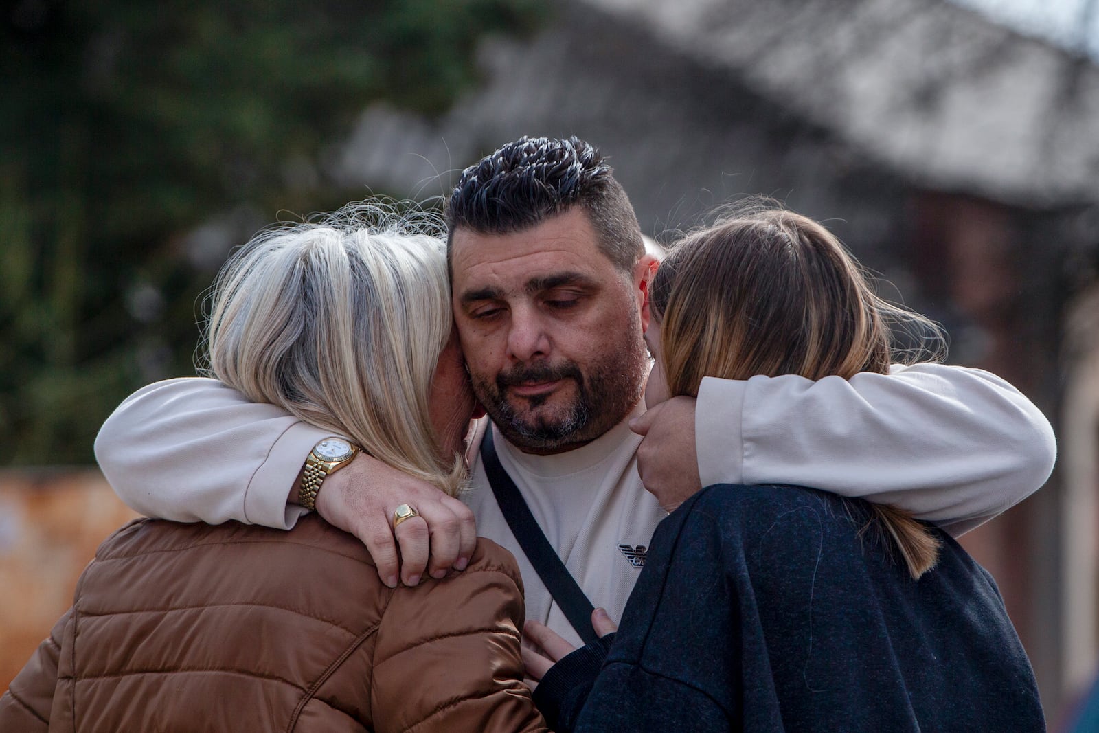 Relatives of victims leave a hospital in the town of Kocani, North Macedonia, Monday, March 17, 2025, following a massive fire in the nightclub early Sunday. (AP Photo/Visar Kryeziu)