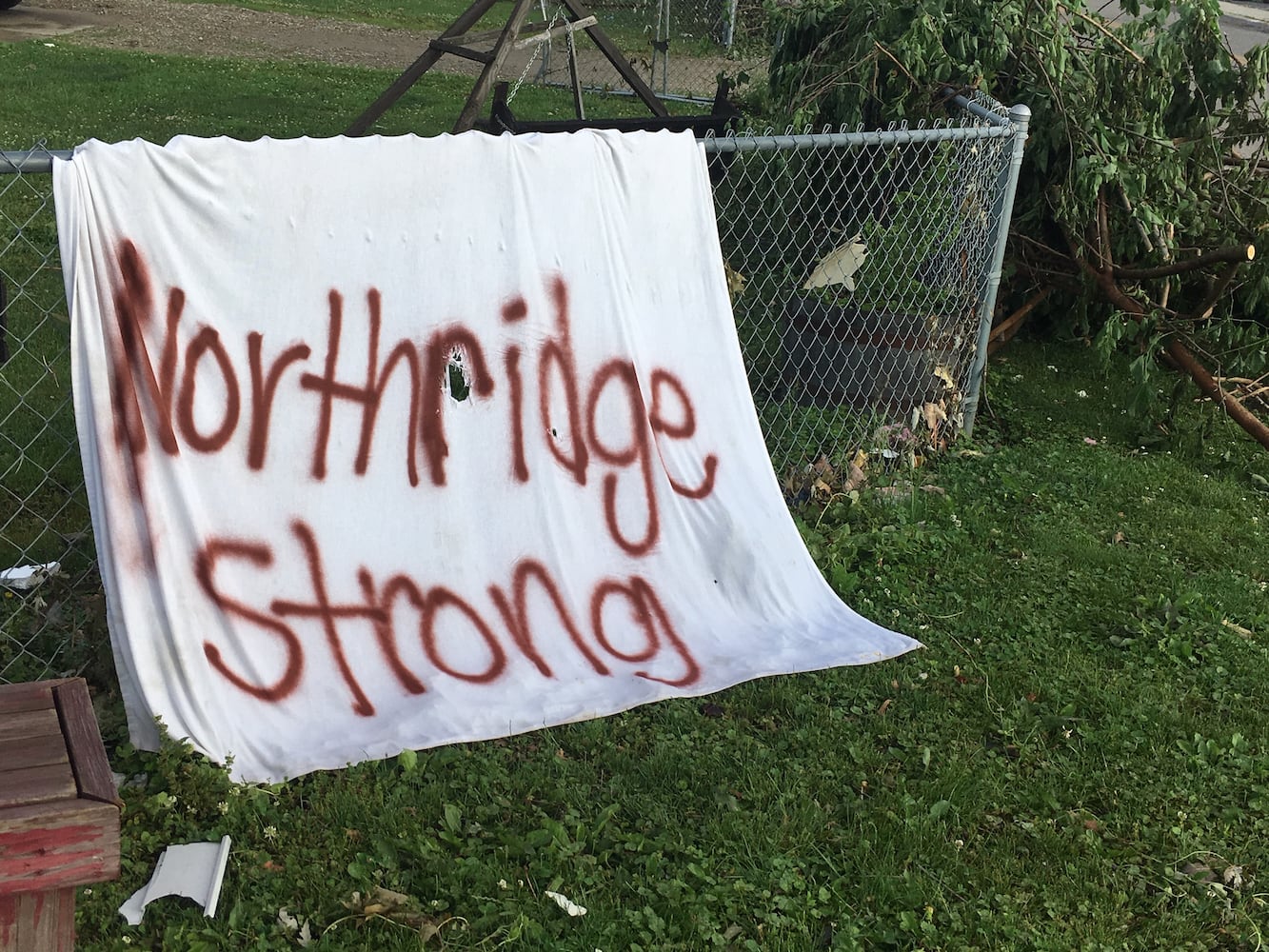 PHOTOS: Tornado-damaged communities dig out, clean up