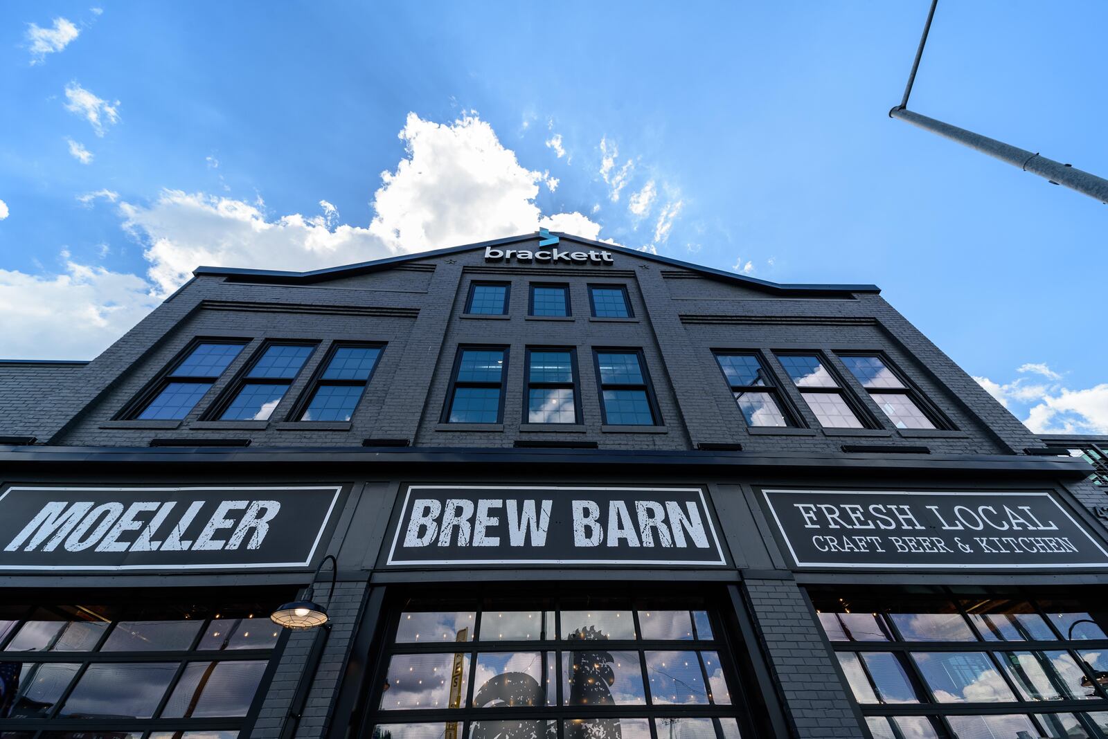 Here’s a look inside the completed Brackett Builders headquarters on the second floor of the mixed-use Madison on First building, located at 418 E. 1st St. in downtown Dayton’s Water Street District across from Day Air Ballpark. Moeller Brew Barn has a new taproom on the first floor. The building was constructed from 1900-1901 for the City Forge & Iron Works Co. and was later part of the Mendelson Liquidation Outlet complex. TOM GILLIAM / CONTRIBUTING PHOTOGRAPHER