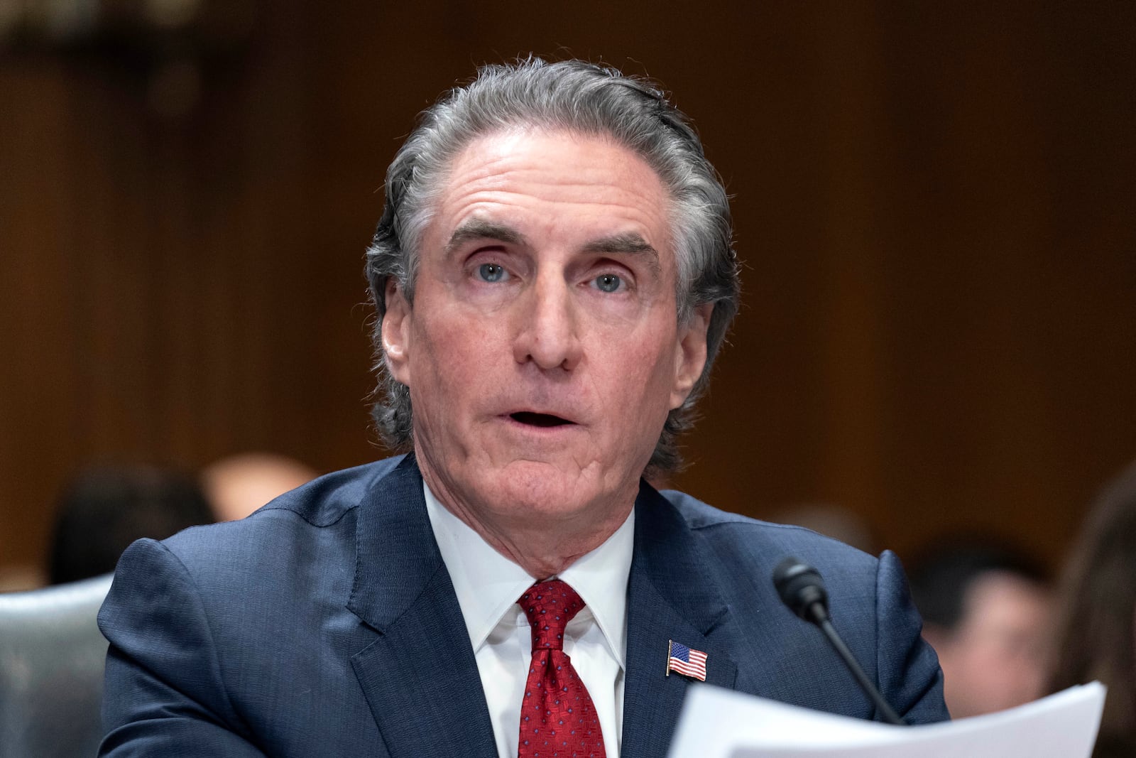 Former Gov. Doug Burgum, President-elect Donald Trump's choice to lead the the Interior Department as Secretary of the Interior, testifies before the Senate Energy and Natural Resources Committee on Capitol Hill in Washington, Thursday, Jan. 16, 2025. (AP Photo/Jose Luis Magana)