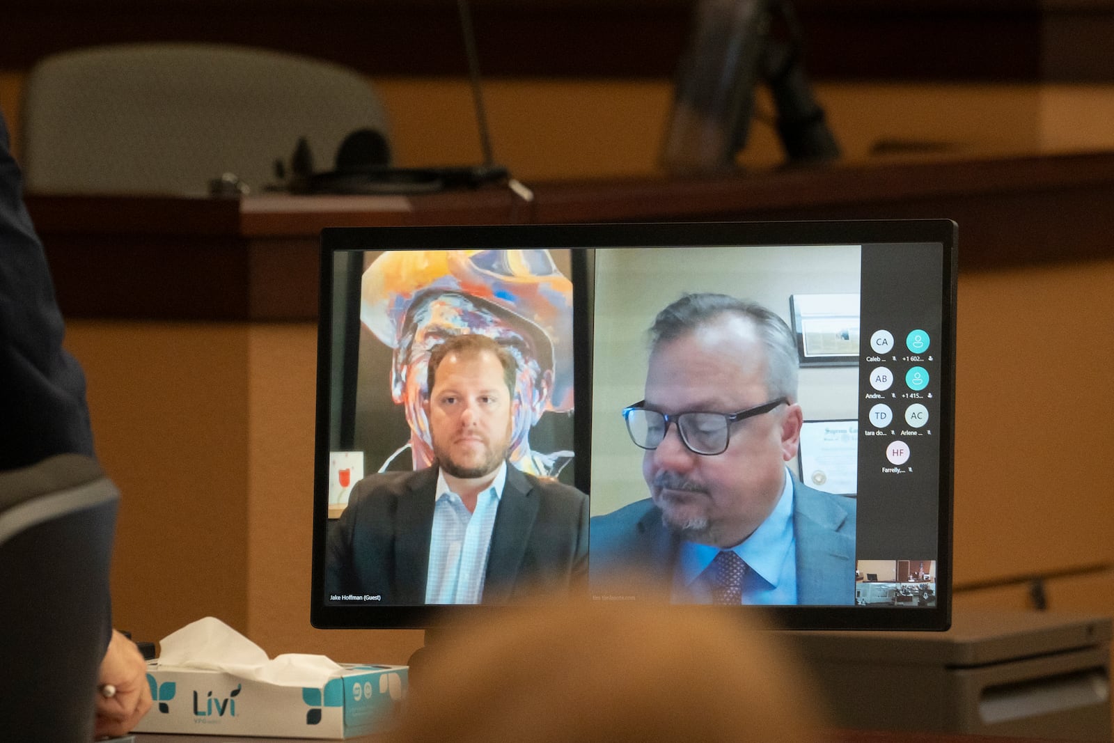 FILE - Arizona Rep. Jake Hoffman, R-Queen Creek, left, and his attorney Timothy La Sota appear virtually for Hoffman's arraignment in Maricopa County Superior Court in Phoenix, June 6, 2024. (Mark Henle/The Arizona Republic via AP, Pool, File)