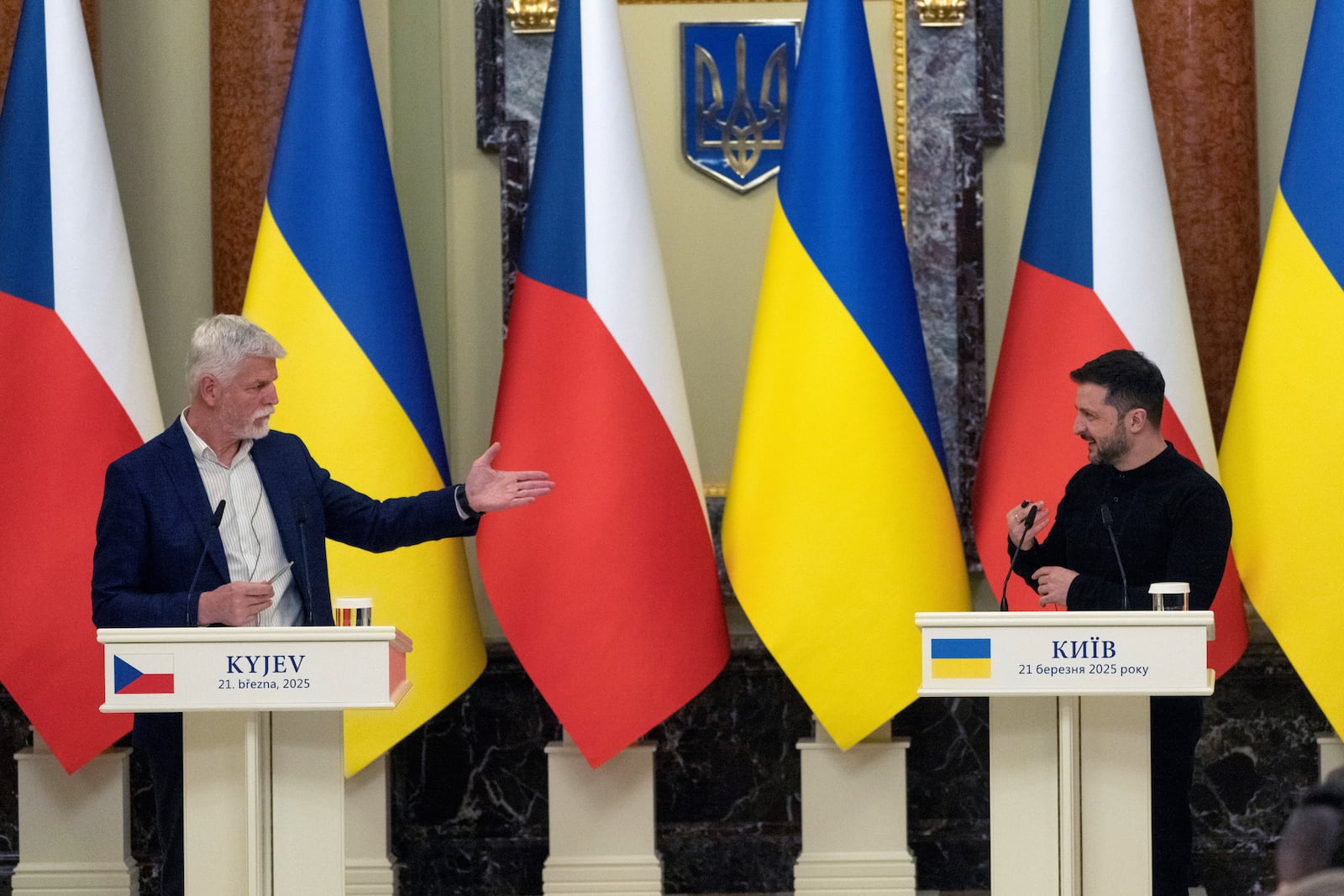 Ukrainian President Volodymyr Zelenskyy, right, and Czech Rebublic's President Petr Pavel speak during joint press conference in Kyiv, Ukraine, Friday, March 21, 2025. (AP Photo/Efrem Lukatsky).