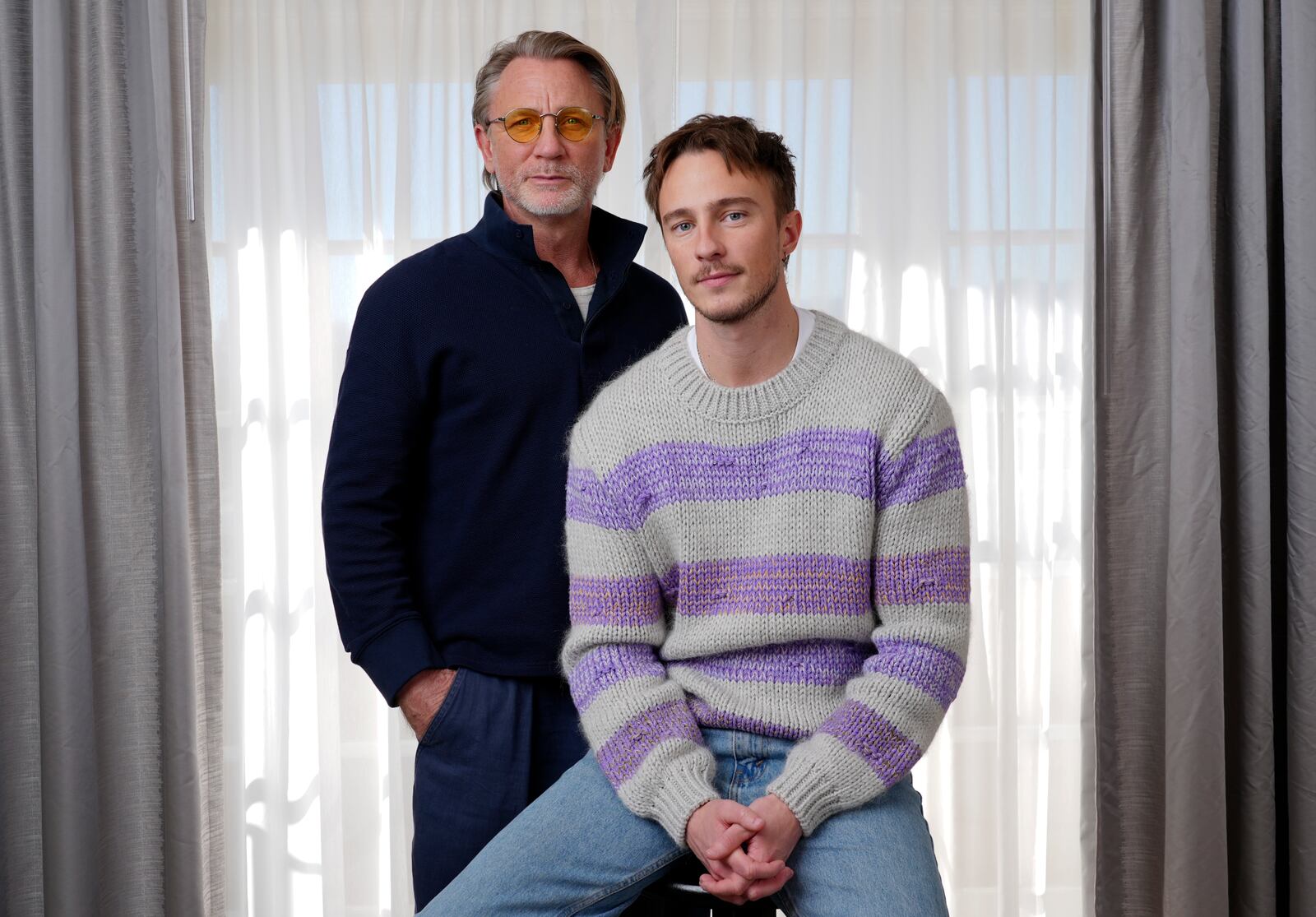 Daniel Craig, left, and Drew Starkey, cast members in the film "Queer," pose together for a portrait to promote the film on Wednesday, Nov. 13, 2024 in Los Angeles. (AP Photo/Chris Pizzello)