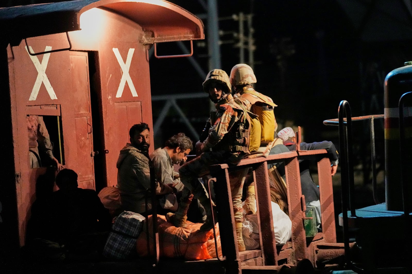 A special train, organized by the army for the wounded and survivors rescued by security forces from a passenger train attacked by insurgents, arrives at a railway station in Much, in Pakistan's southwestern Balochistan province, Wednesday, March 12, 2025. (AP Photo/Anjum Naveed)