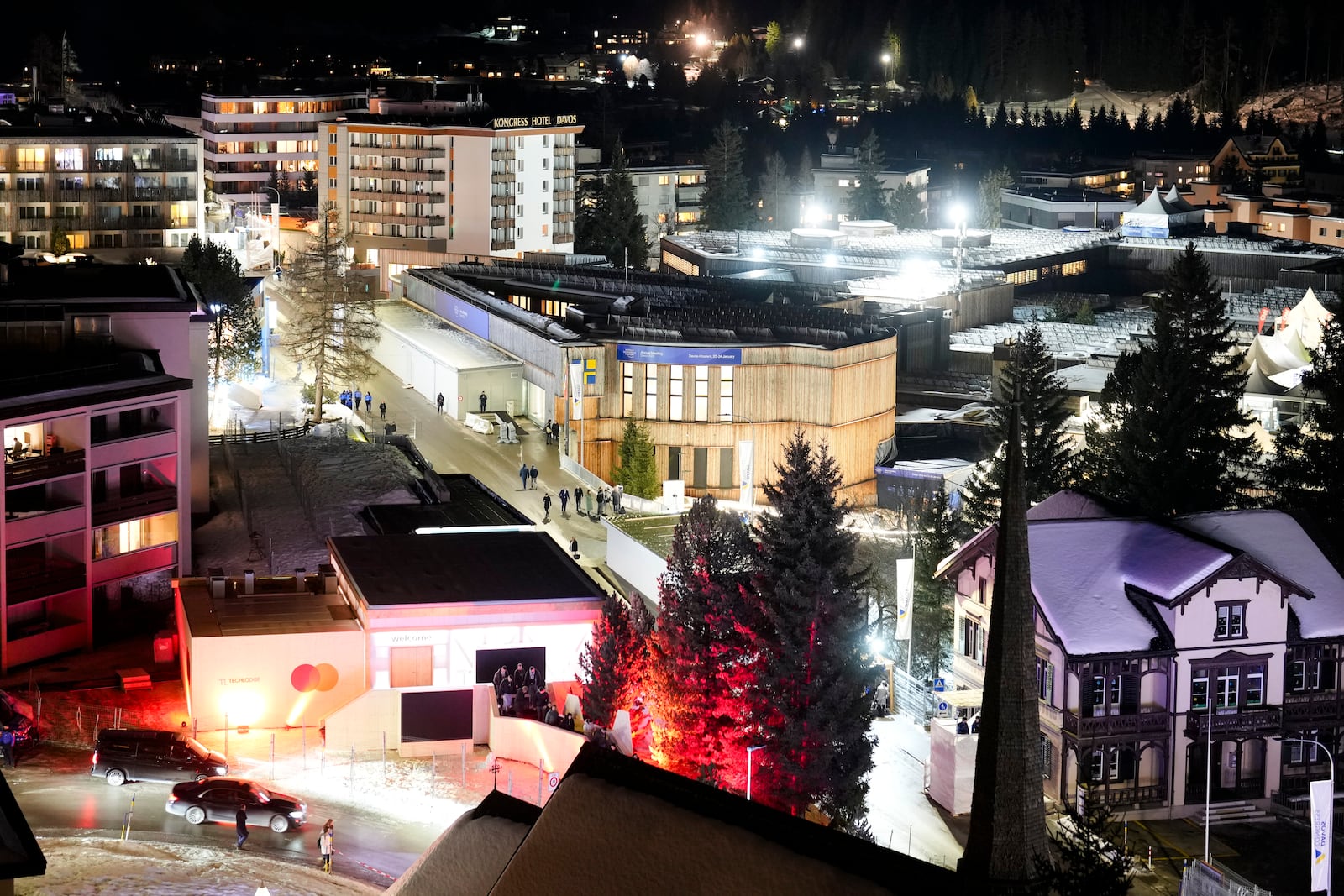 The Congress Center where the Annual Meeting of the World Economy forum take place is illuminated in Davos, Switzerland, Sunday, Jan. 19, 2025. (AP Photo/Markus Schreiber)